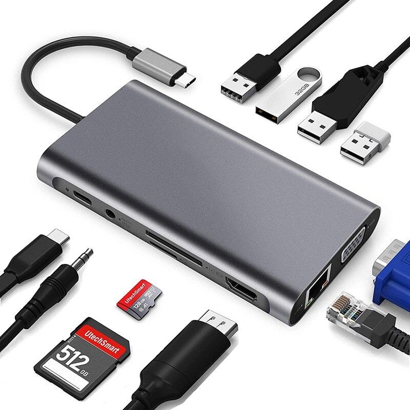 Beyaz arka planda çeşitli kablolar, SD kartlar ve konektörlerle çevrili gri USB-C hub.