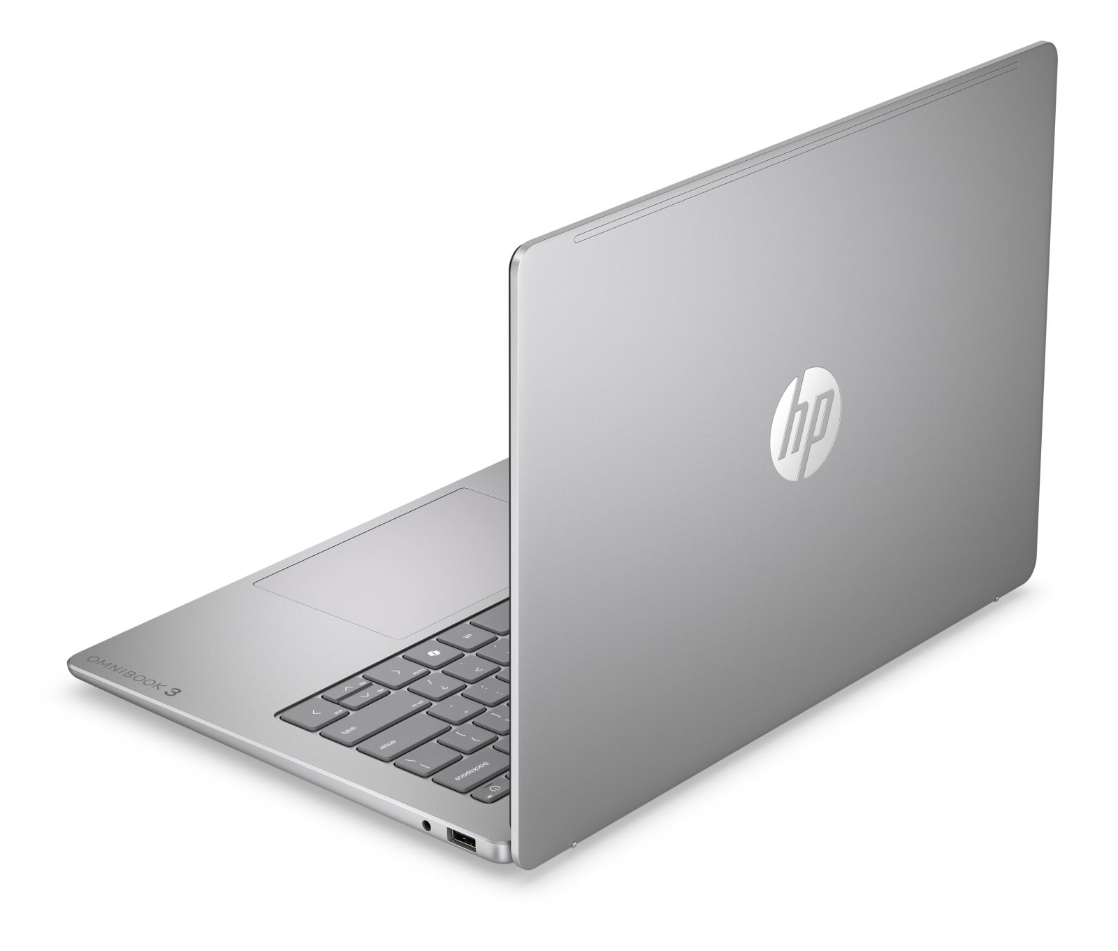 Ein silberner HP Omnibook 3 Laptop in dreiviertel Ansicht auf weißem Hintergrund.
