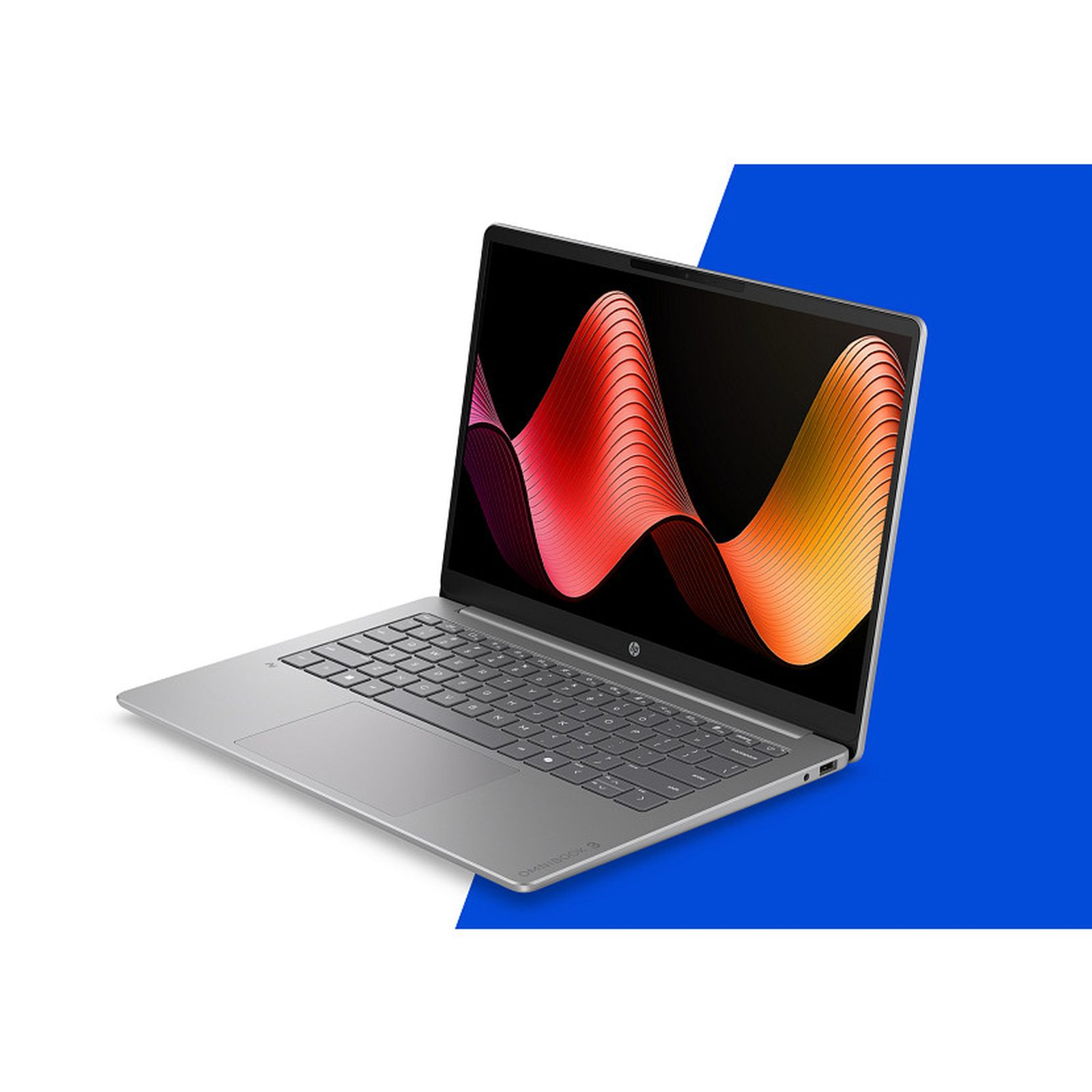 Ein silberner Laptop mit einem bunten Wellenmuster auf dem Bildschirm vor einem weiß-blauen Hintergrund.