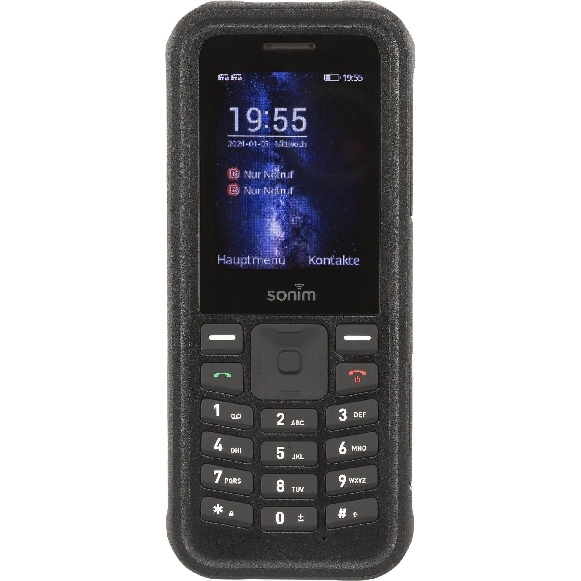 Un teléfono móvil negro resistente con teclado físico y pantalla con fondo de nebulosa azul.
