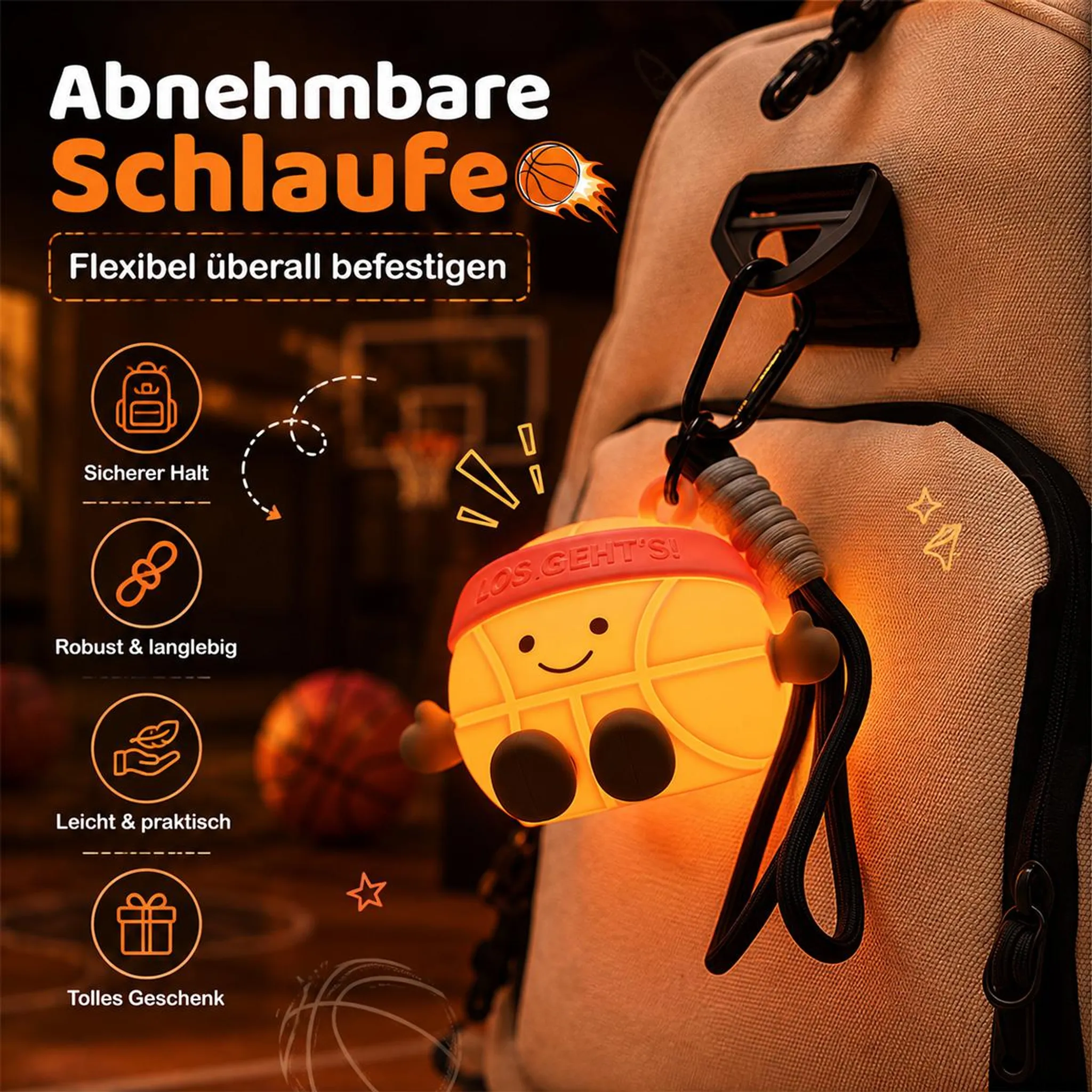 Eine orangefarbene, basketballförmige Hülle mit Gesicht ist an einem Rucksack befestigt, mit deutschem Text.