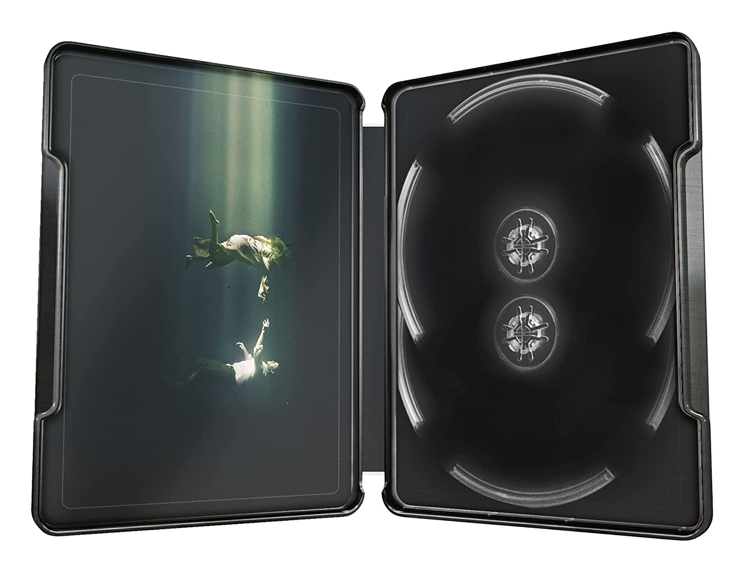 Estuche steelbook negro abierto. El lado izquierdo muestra dos figuras flotando bajo la luz. El lado derecho tiene dos discos.