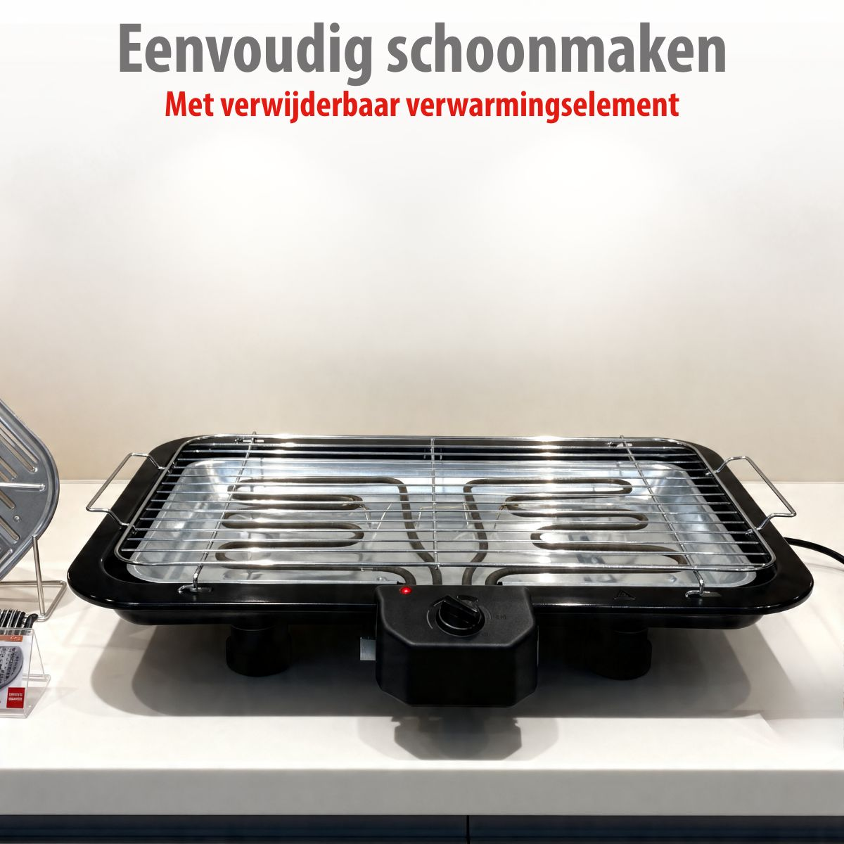 Elektrische tafelgrill met metalen rooster en verwarmingselement op wit oppervlak met Nederlandse tekst.