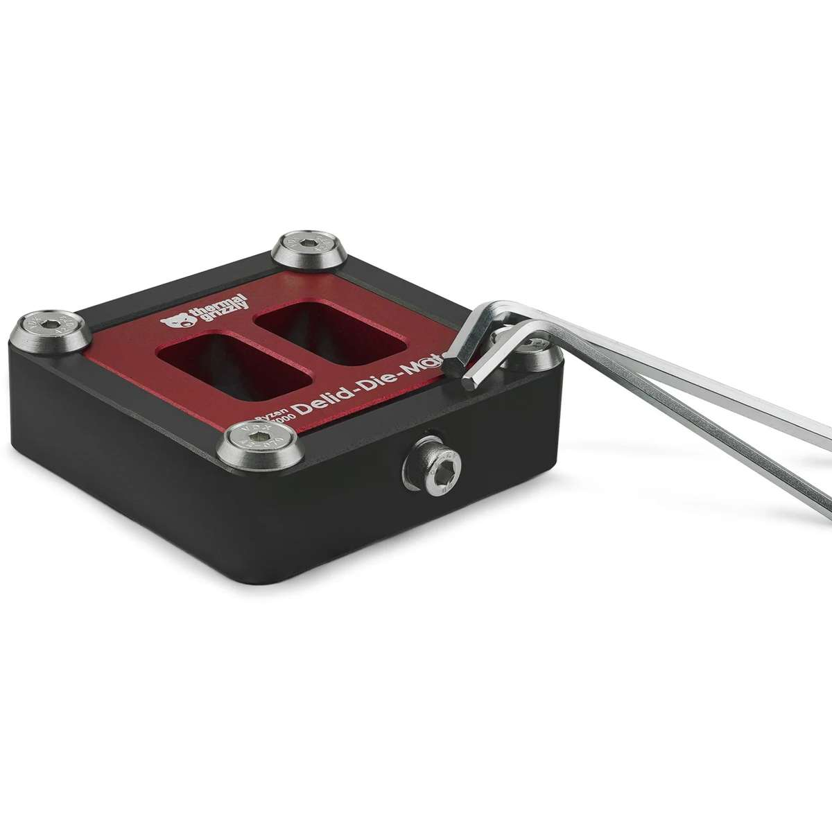 Ein schwarz-rotes Thermal Grizzly Delid-Die-Mate Werkzeug mit Metallschrauben und Inbusschlüssel auf weißem Grund.