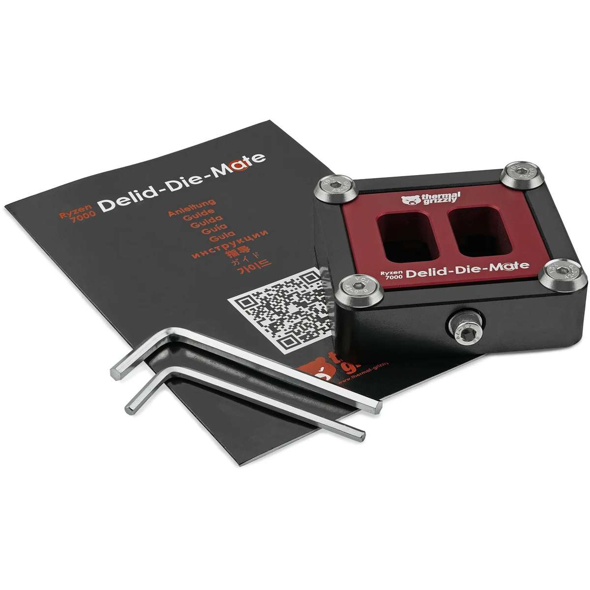 Thermal Grizzly Ryzen 7000 Delid-Die-Mate Werkzeug mit Handbuch und Innensechskantschlüsseln auf weißem Hintergrund.