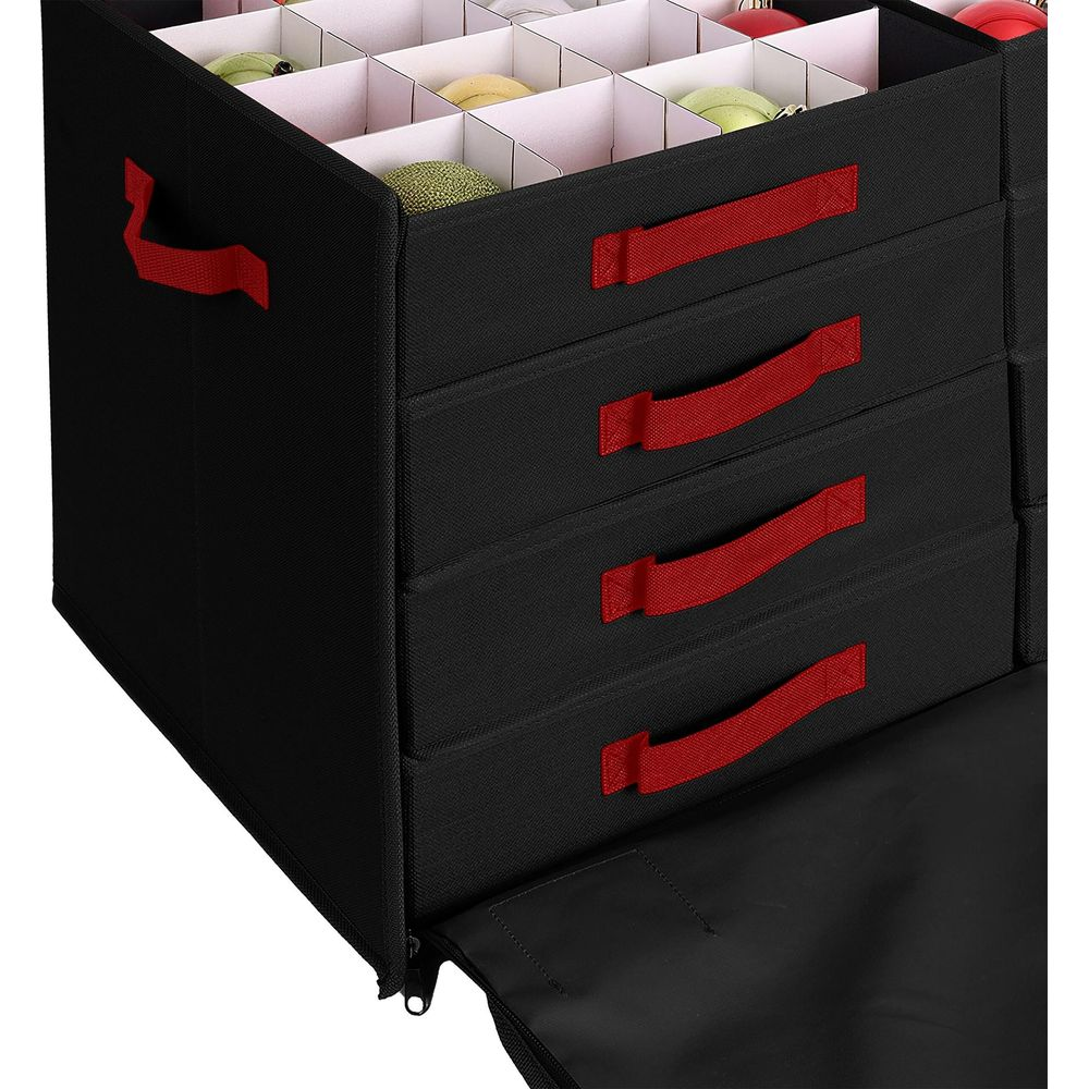 Schwarze Aufbewahrungsbox mit roten Griffen und gefüllten Fächern oben.
