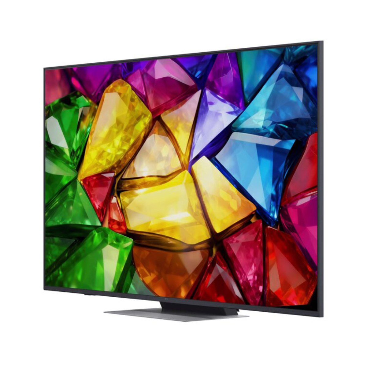 Ein moderner Fernseher zeigt ein lebhaftes, abstraktes Muster aus bunten, geometrischen Kristallen auf weißem Grund.