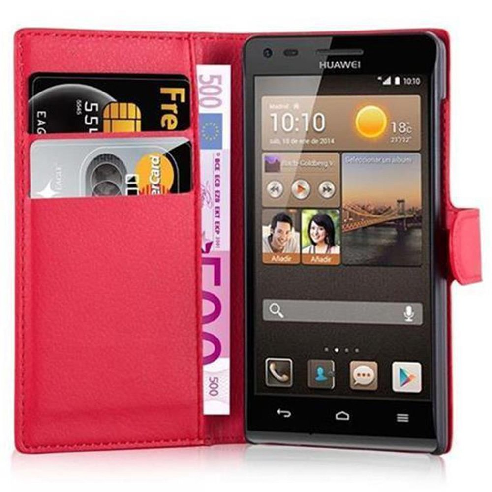 Funda de teléfono roja abierta con teléfono, tarjetas y dinero. El teléfono muestra una pantalla.