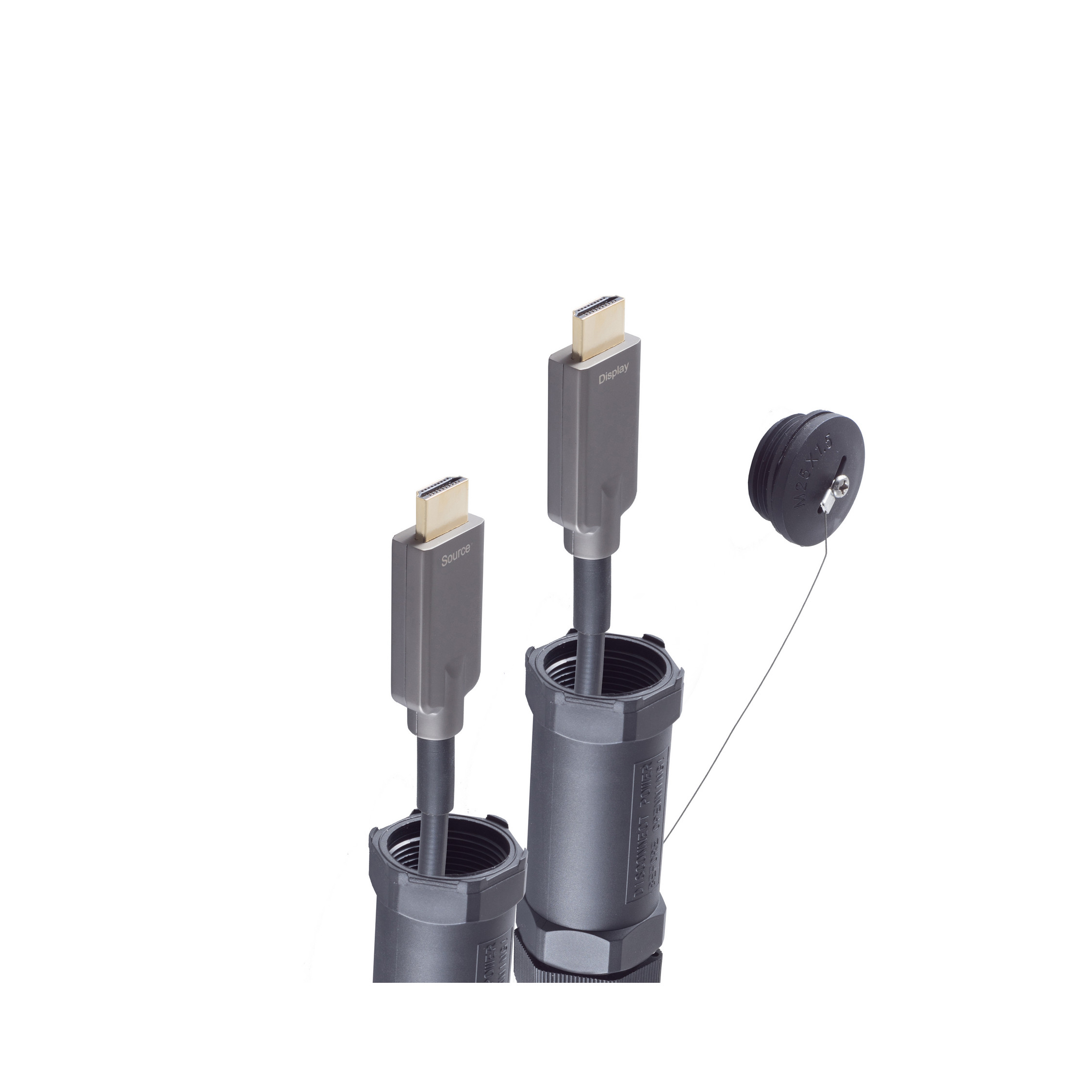Zwei graue HDMI-Kabel, die aus grauen zylindrischen Steckern kommen. Rechts eine schwarze Kabeltrommel.