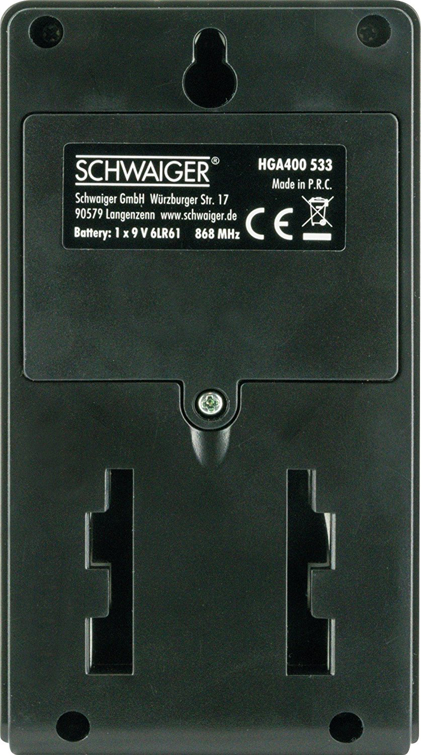 Rückseite eines schwarzen Geräts mit Halterungen und Text.