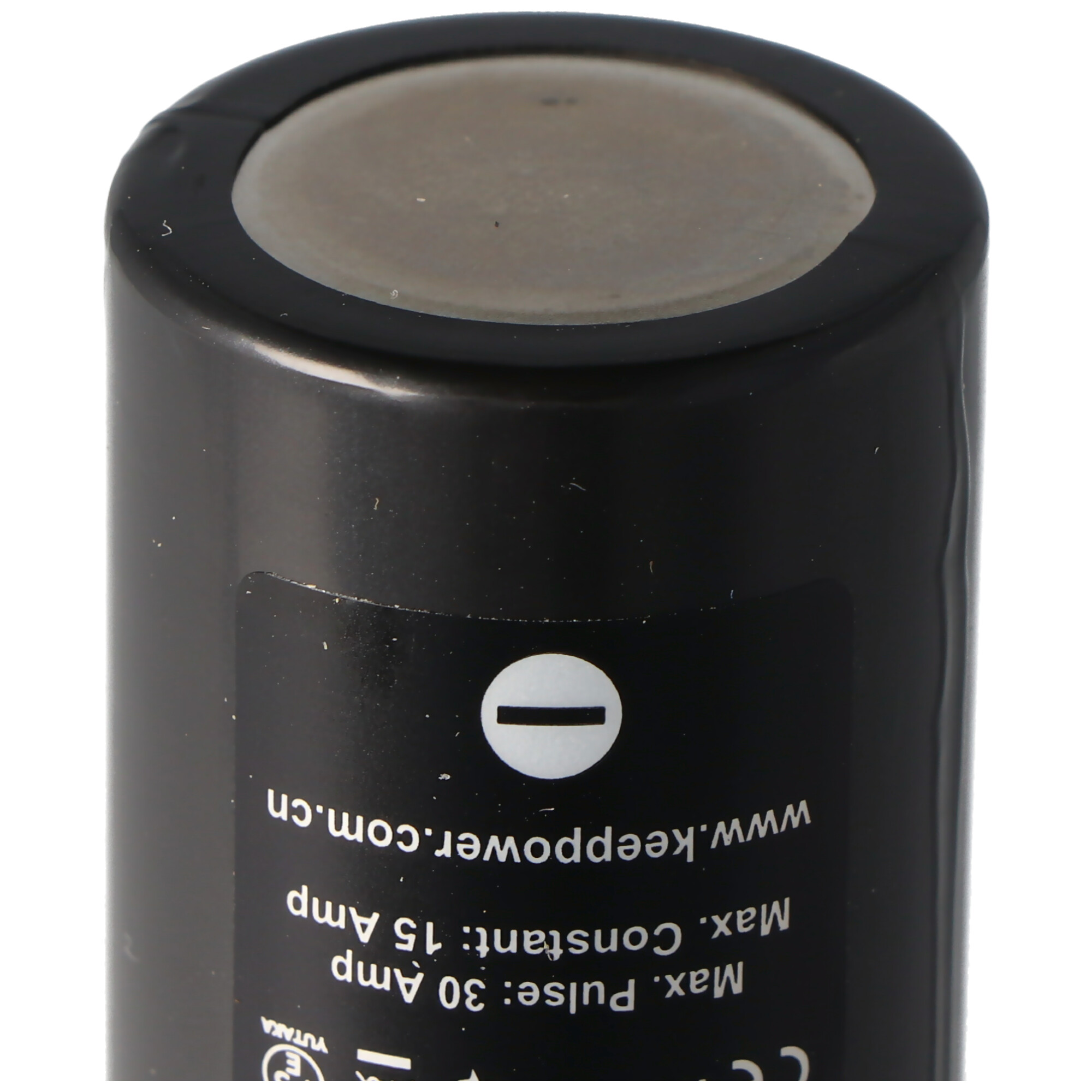 Black battery with a negative sign and the website address printed on it.