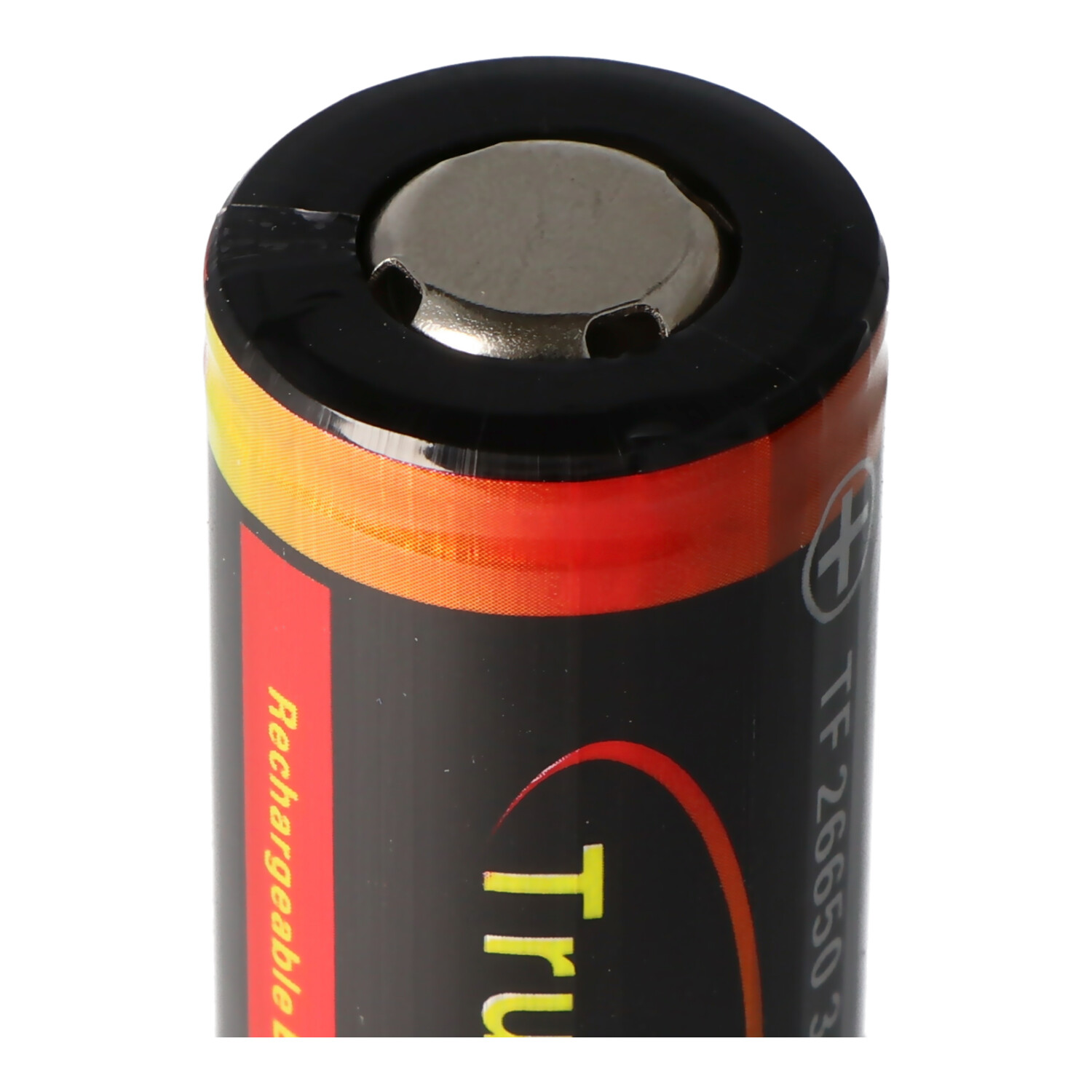 Zwarte en gele batterij met tekst en een metalen bovenkant.
