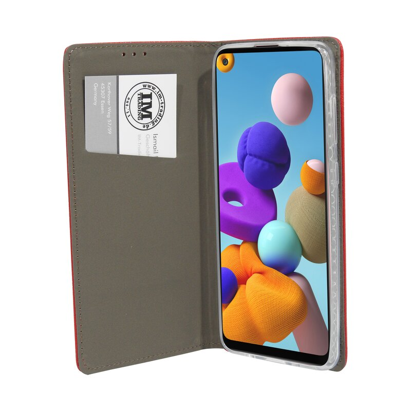 Geöffnete Handyhülle mit einem Telefon, das bunte Formen zeigt.