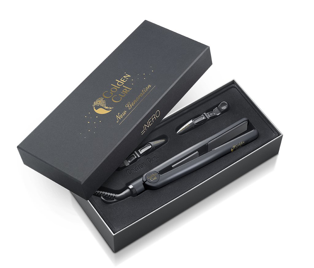 Eine schwarze, offene Box, die ein Glätteisen, Zubehör und den Text 'Golden Curl New Generation Nero' zeigt.