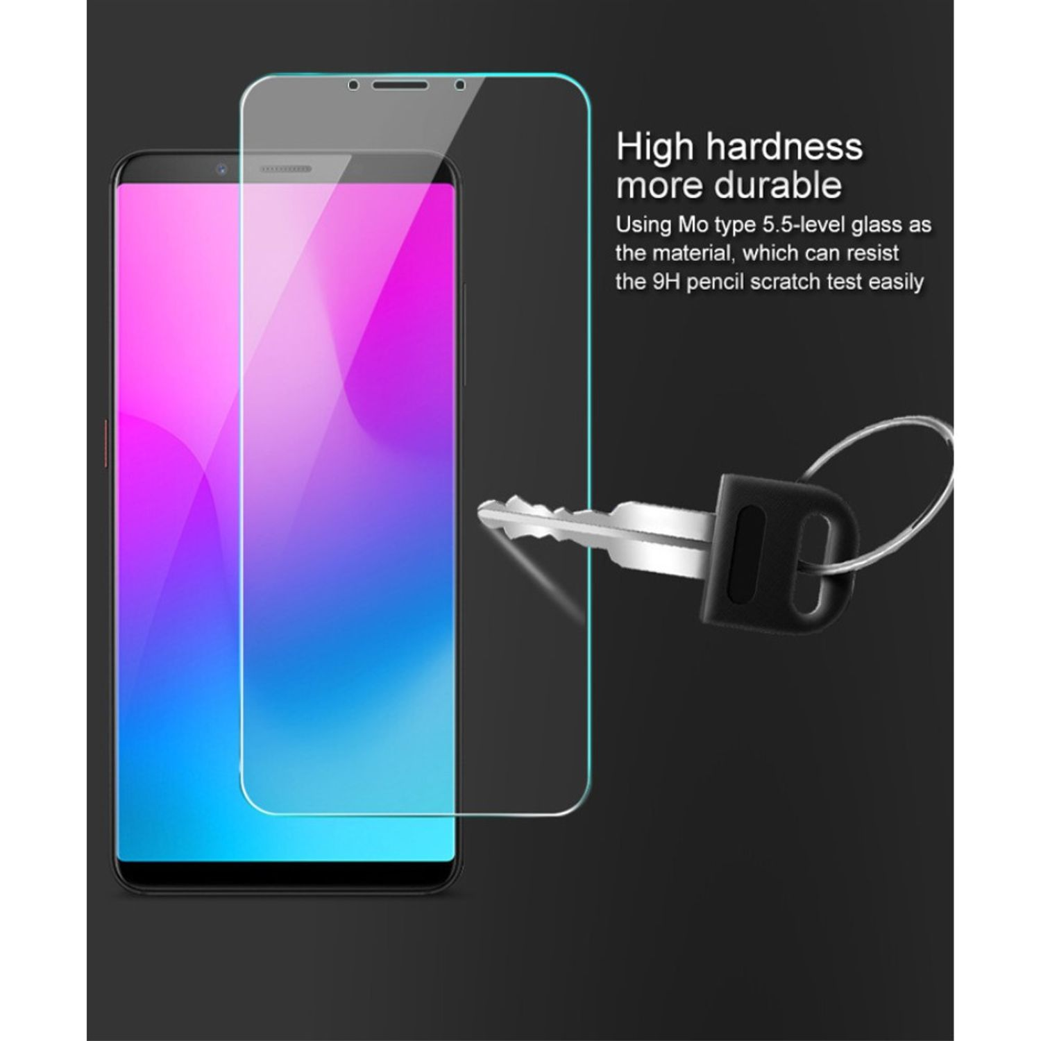 Ein Telefon und ein Glas-Displayschutz mit Text. Das Telefon befindet sich auf einer dunklen Oberfläche. Ein Schlüssel daneben.