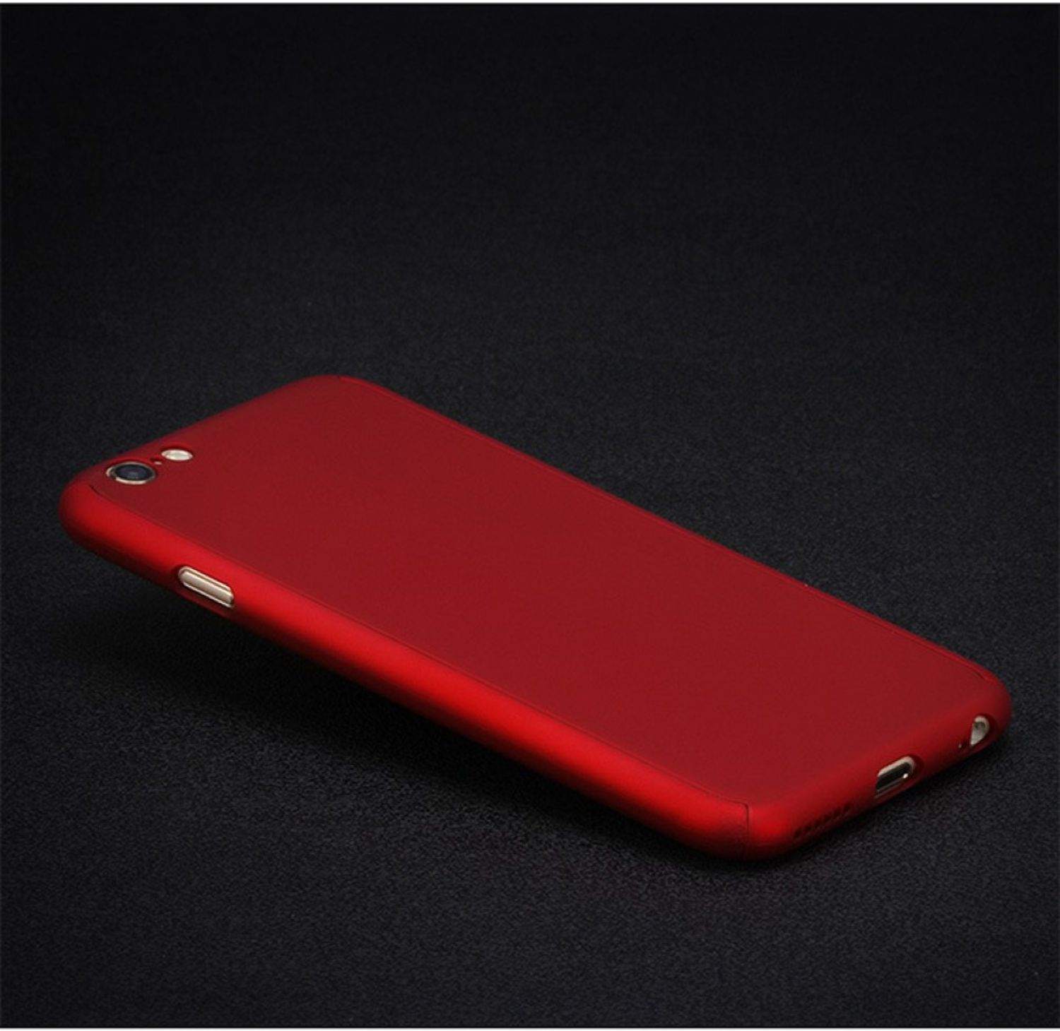 Rotes Telefon auf schwarzer Oberfläche.
