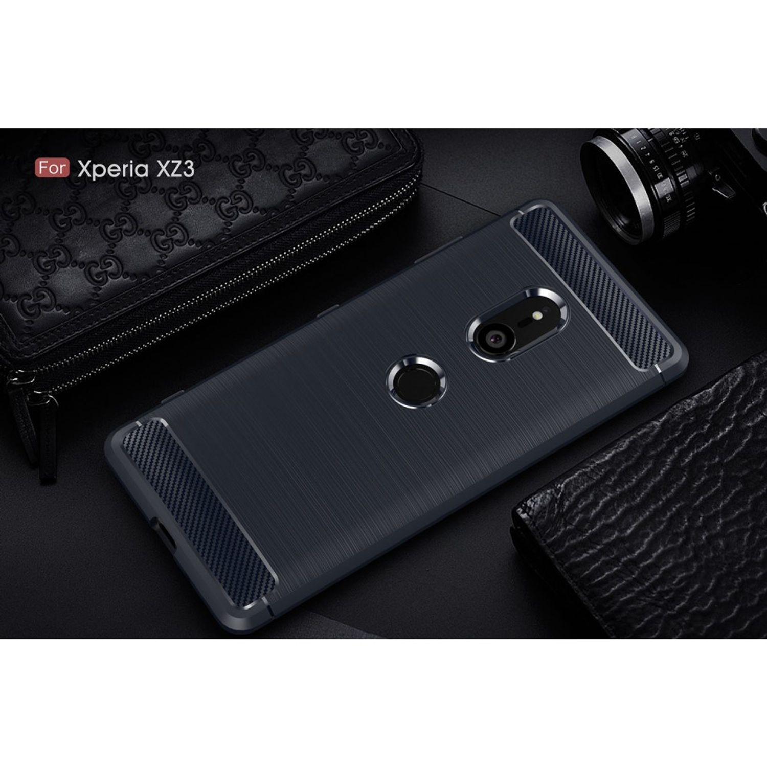 Schwarze Handyhülle für Xperia XZ3 auf einem Tisch. Geldbörse und Kamera sind ebenfalls auf dem Tisch.