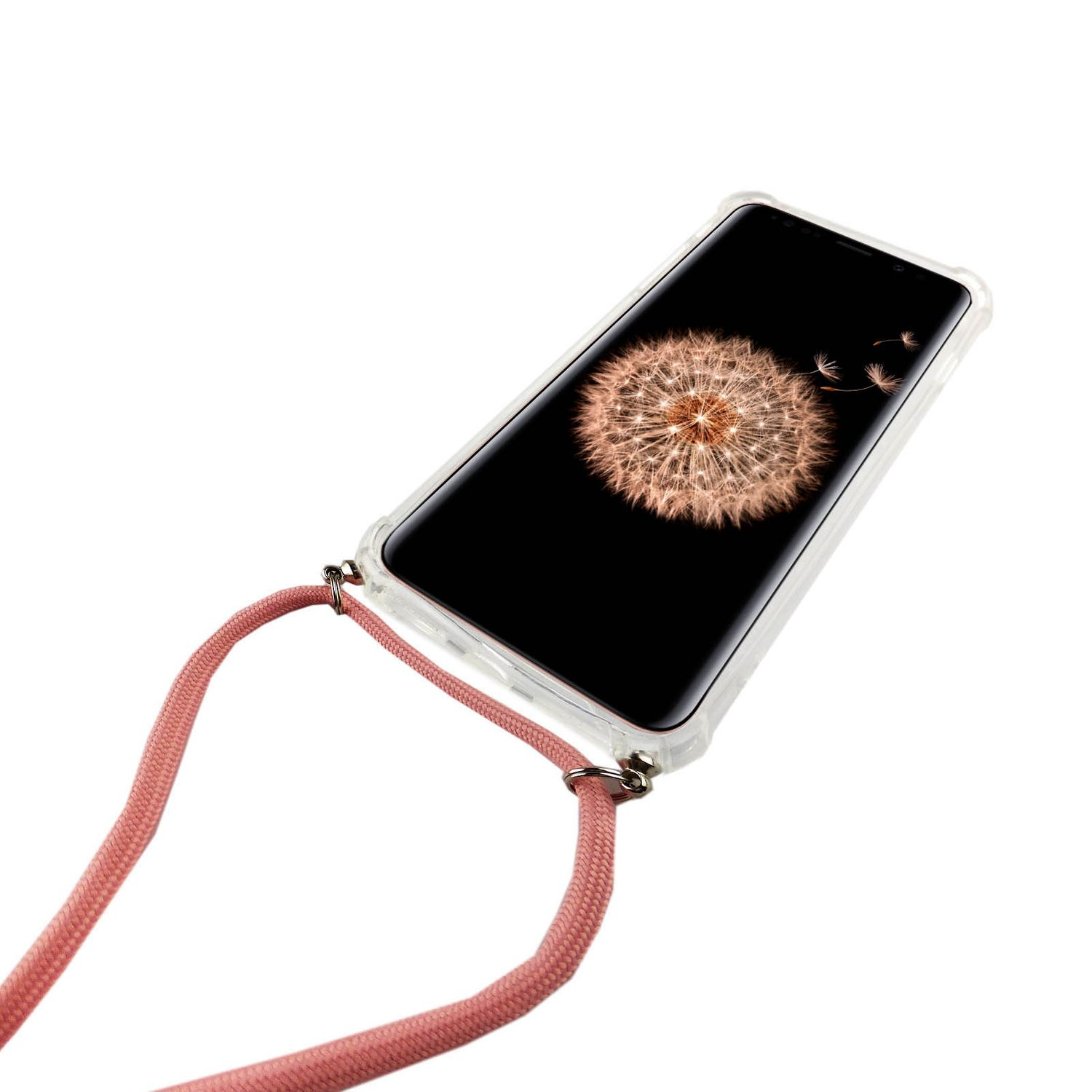 Ein Telefon mit durchsichtiger Hülle und rosa Kordel. Der Bildschirm zeigt eine Pusteblume.