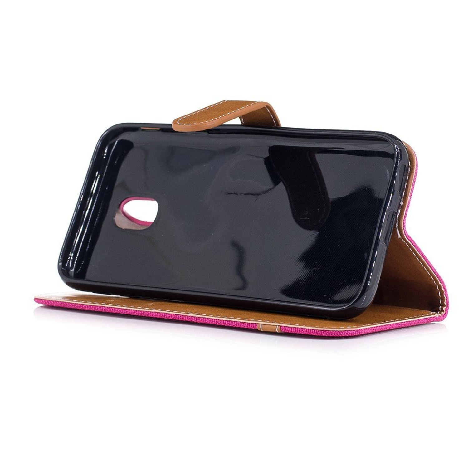 Ein Telefon in einer rosa-braunen Hülle. Das Telefon liegt auf einer weißen Oberfläche.