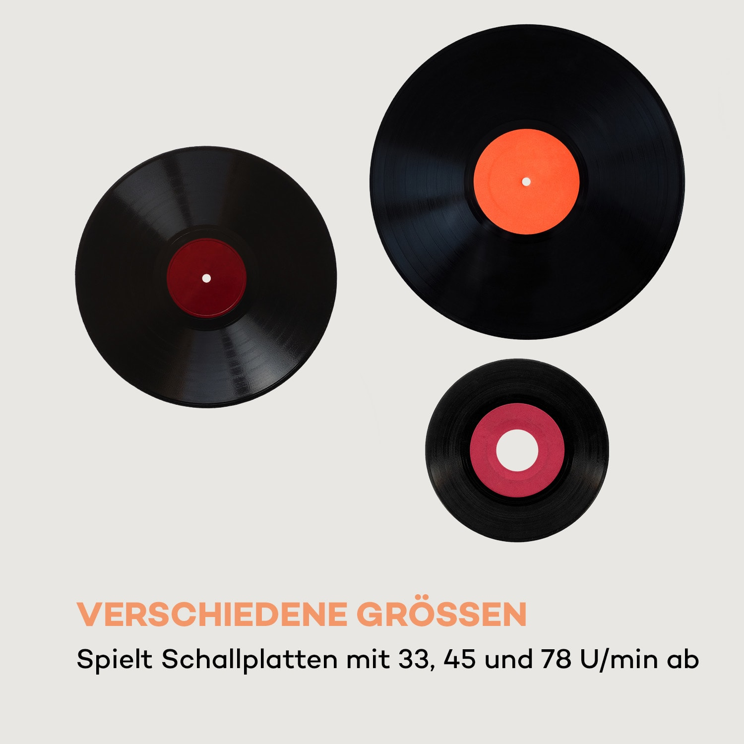 Schwarze Schallplatten mit roten und orangefarbenen Etiketten. Text auf Deutsch: 'VERSCHIEDENE GRÖSSEN'.