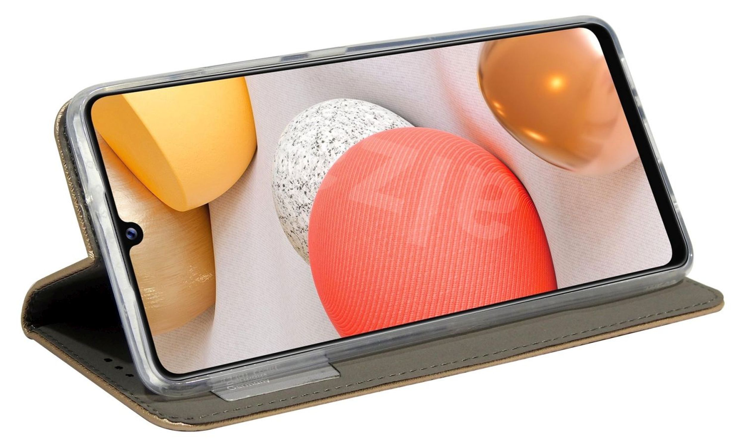 Ein Smartphone in einer Hülle, geöffnet, zeigt einen Bildschirm mit abstrakten Farben. Die Hülle ist gold.