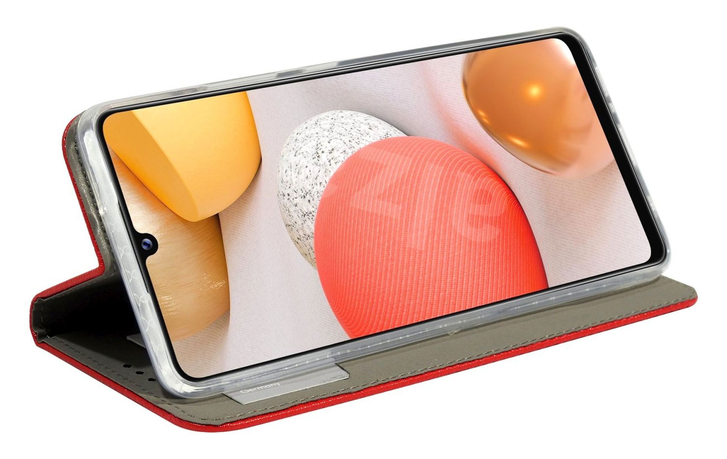Ein Smartphone in roter Hülle ist geöffnet und zeigt farbenfrohe, abstrakte Formen. Die Hülle liegt auf weißem Untergrund.