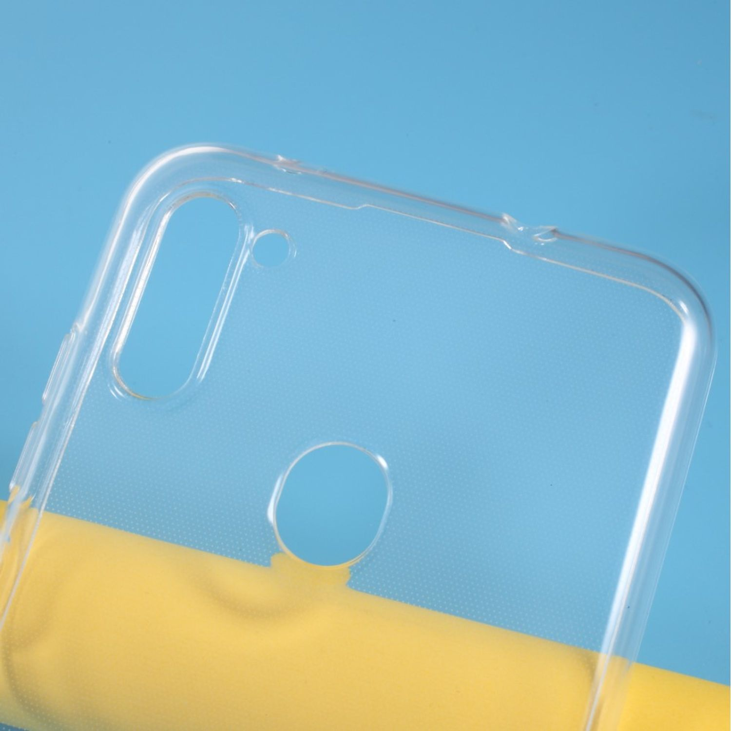 Transparente Handyhülle. Blauer und gelber Hintergrund. Zeigt Kamera- und Lautsprecherlöcher.