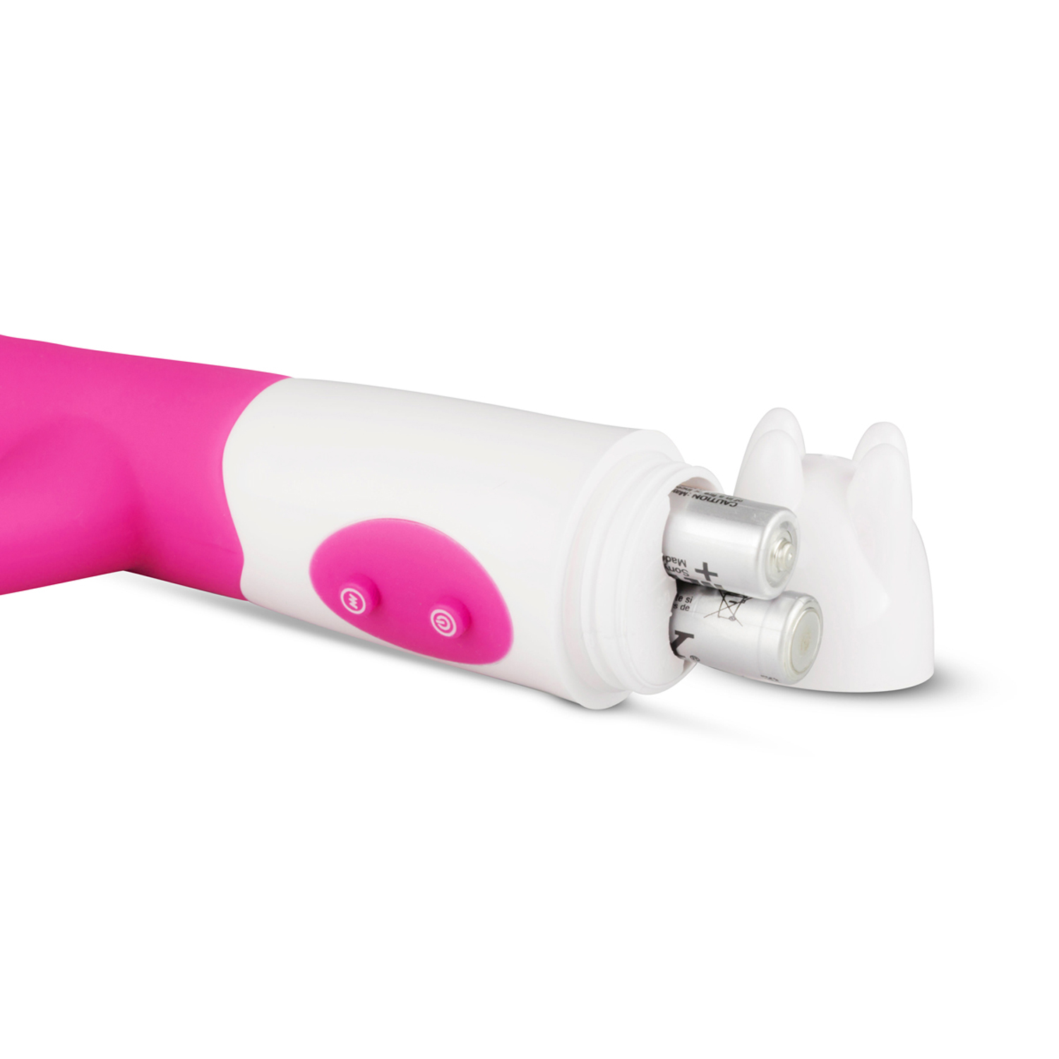 Weißes und rosa Sexspielzeug mit Batterien im Fach sichtbar.