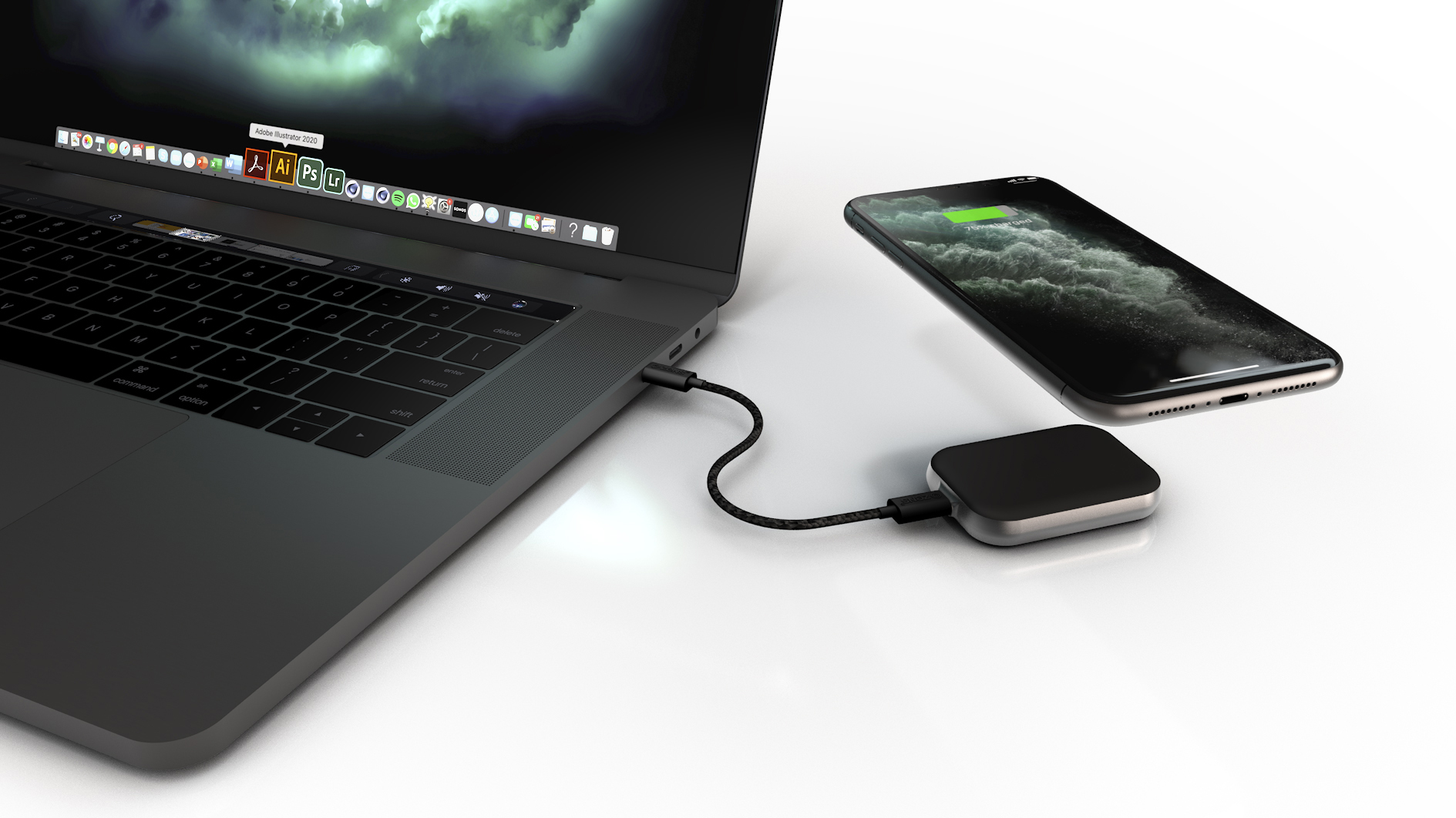 Ein Laptop, der über ein schwarzes Ladekabel und einen Ladeadapter mit einem Telefon verbunden ist.