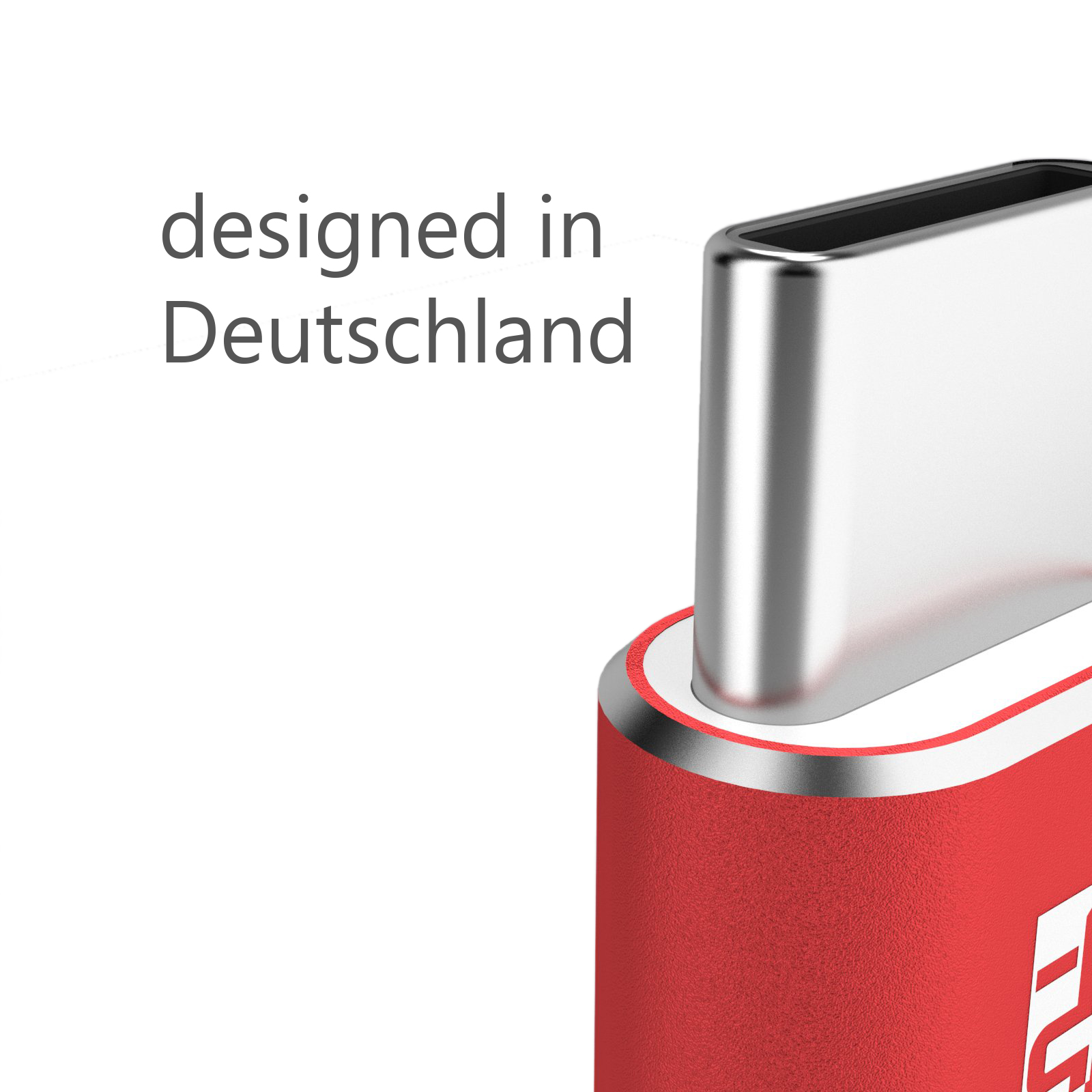 Nahaufnahme eines roten und silbernen USB-C-Anschlusses. Text: „designed in Deutschland“.