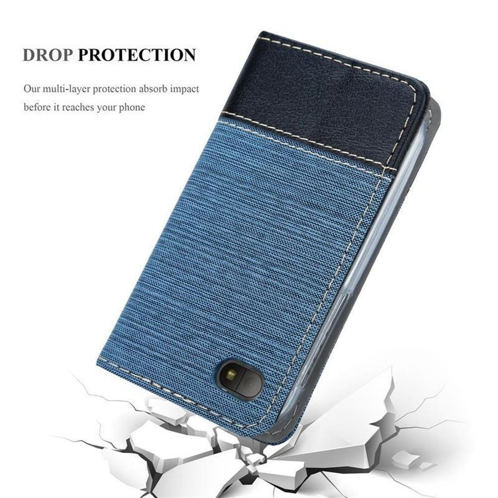Custodia per telefono blu con design blu e nero. La custodia è su una superficie che si rompe.