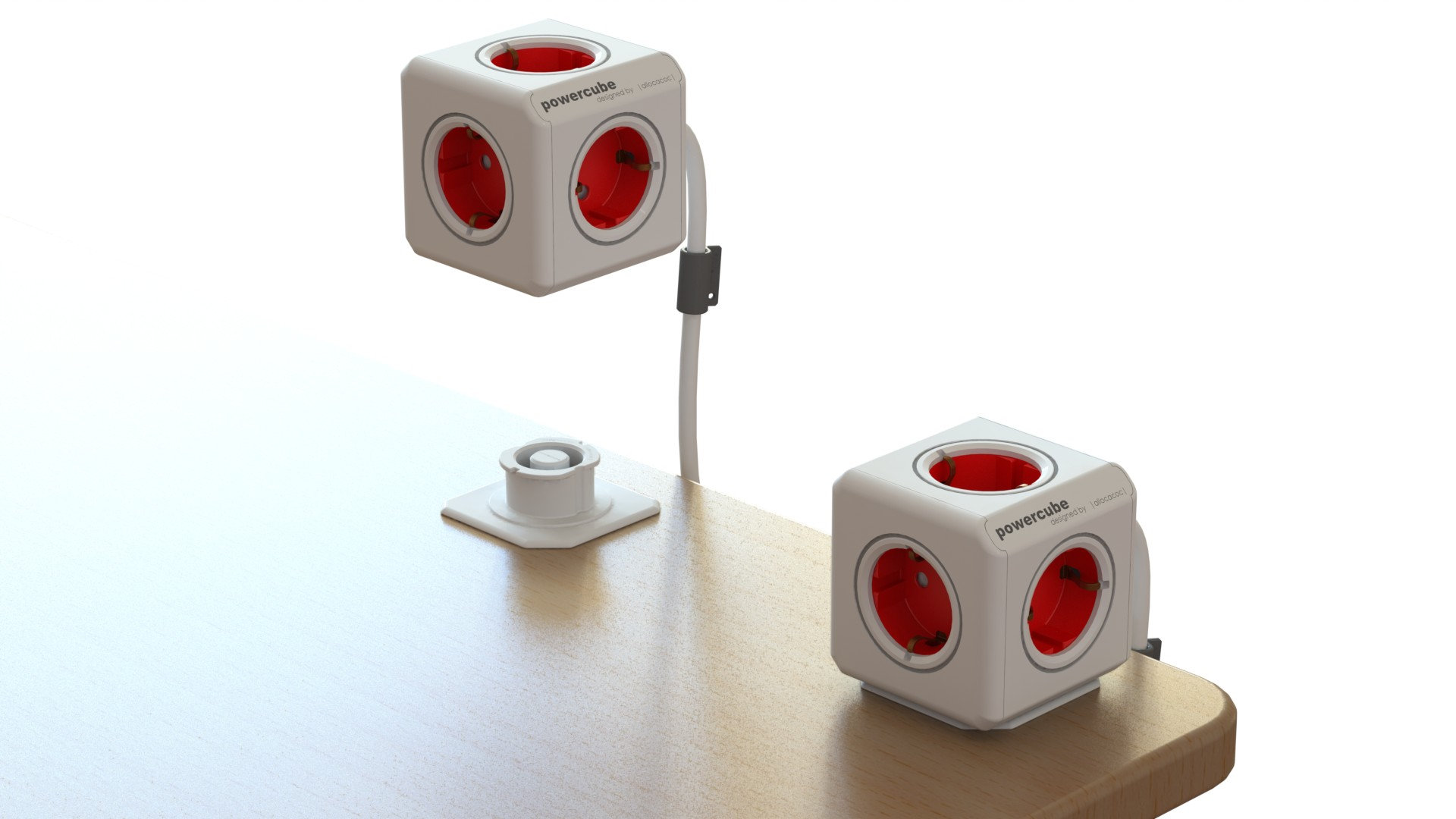 Weiße Power Cubes mit roten Steckdosen und einem weißen Kabel. Sie befinden sich auf einer hellen Holzoberfläche.