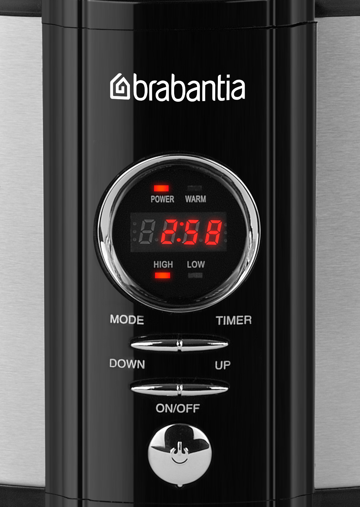 A black and silver appliance control panel with a digital display and buttons.