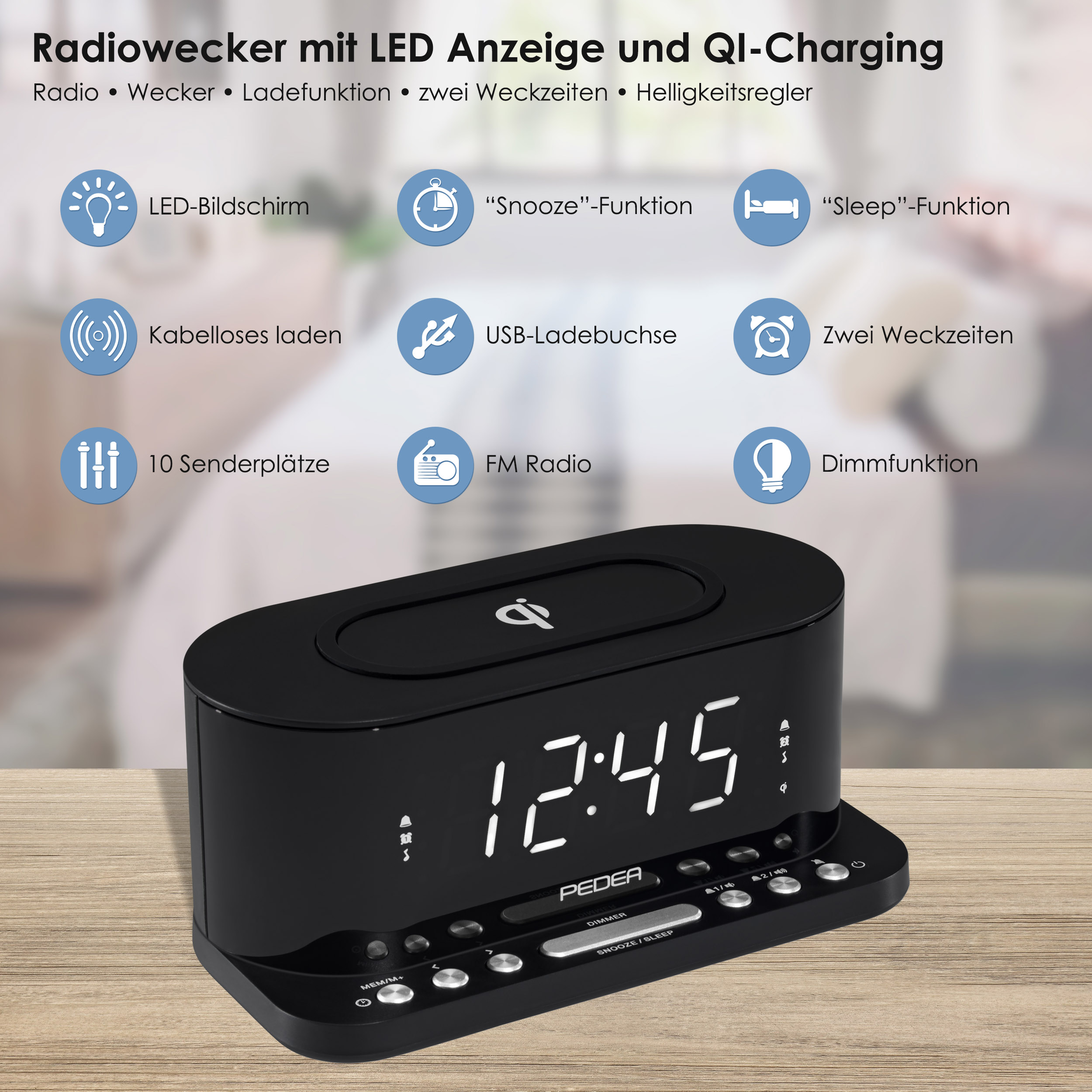 Despertador digital negro con iconos de función y pantalla, sobre superficie de madera.