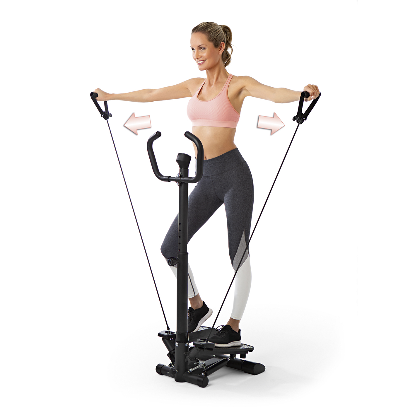 Eine Frau benutzt eine Stepper-Maschine mit Widerstandsbändern. Sie trägt Sportkleidung.
