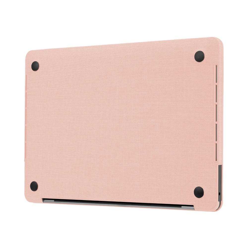 Custodia per laptop rosa. Quattro punti neri sulla custodia.