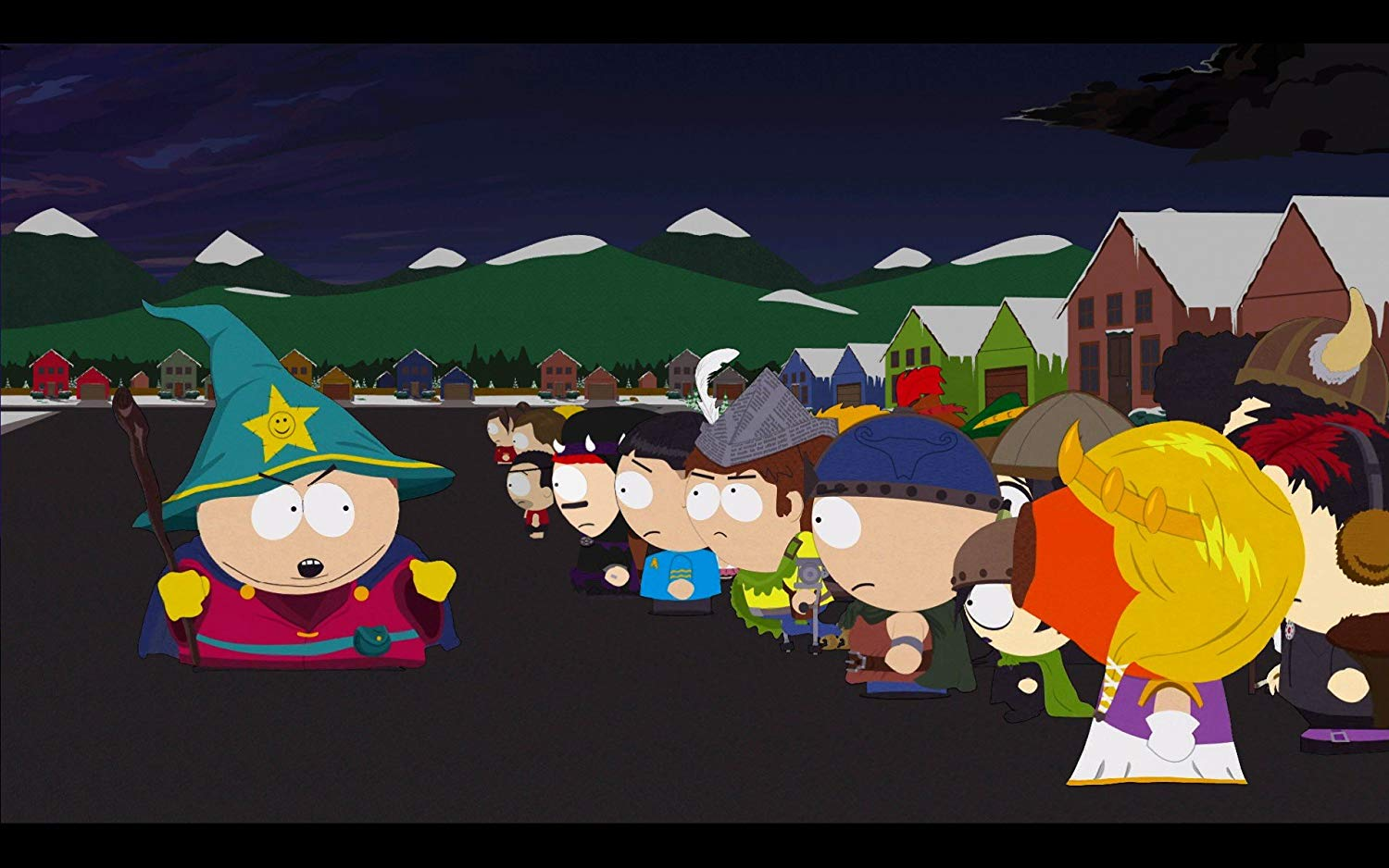 South Park Charaktere auf einer Straße bei Nacht. Ein Zauberer vorne, andere dahinter. Dunkler Hintergrund.