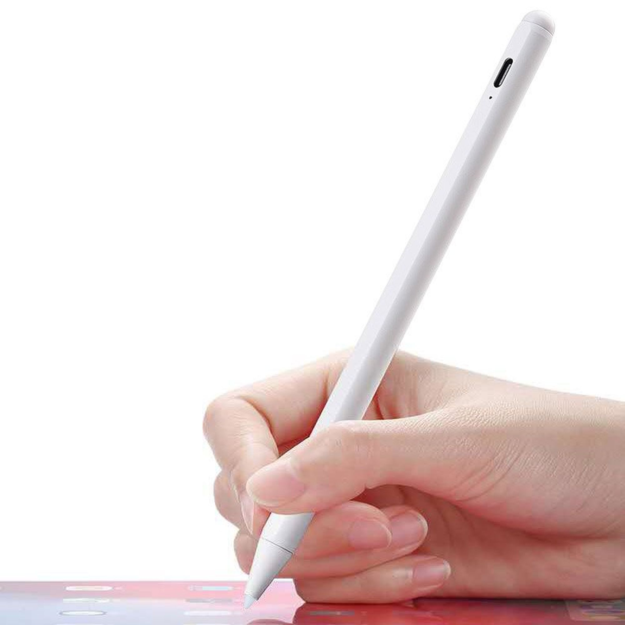 Ein weißer Stift wird von einer Hand gehalten. Die Hand hält den Stift über einem Bildschirm.
