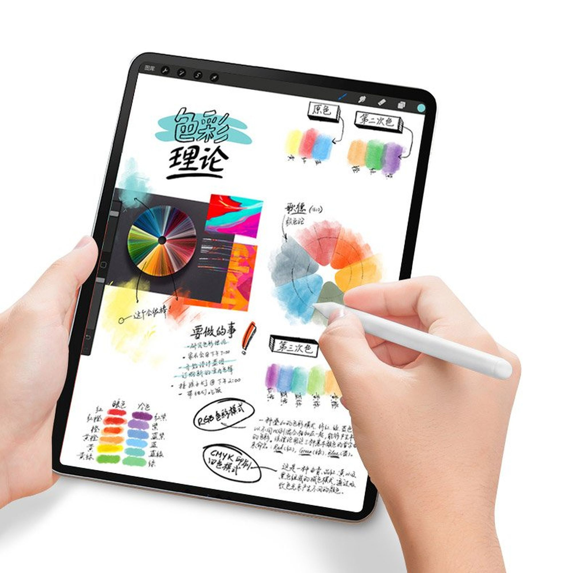 Hände halten ein Tablet mit Farbtheorie-Notizen. Mit einem Stift wird auf den Bildschirm geschrieben.