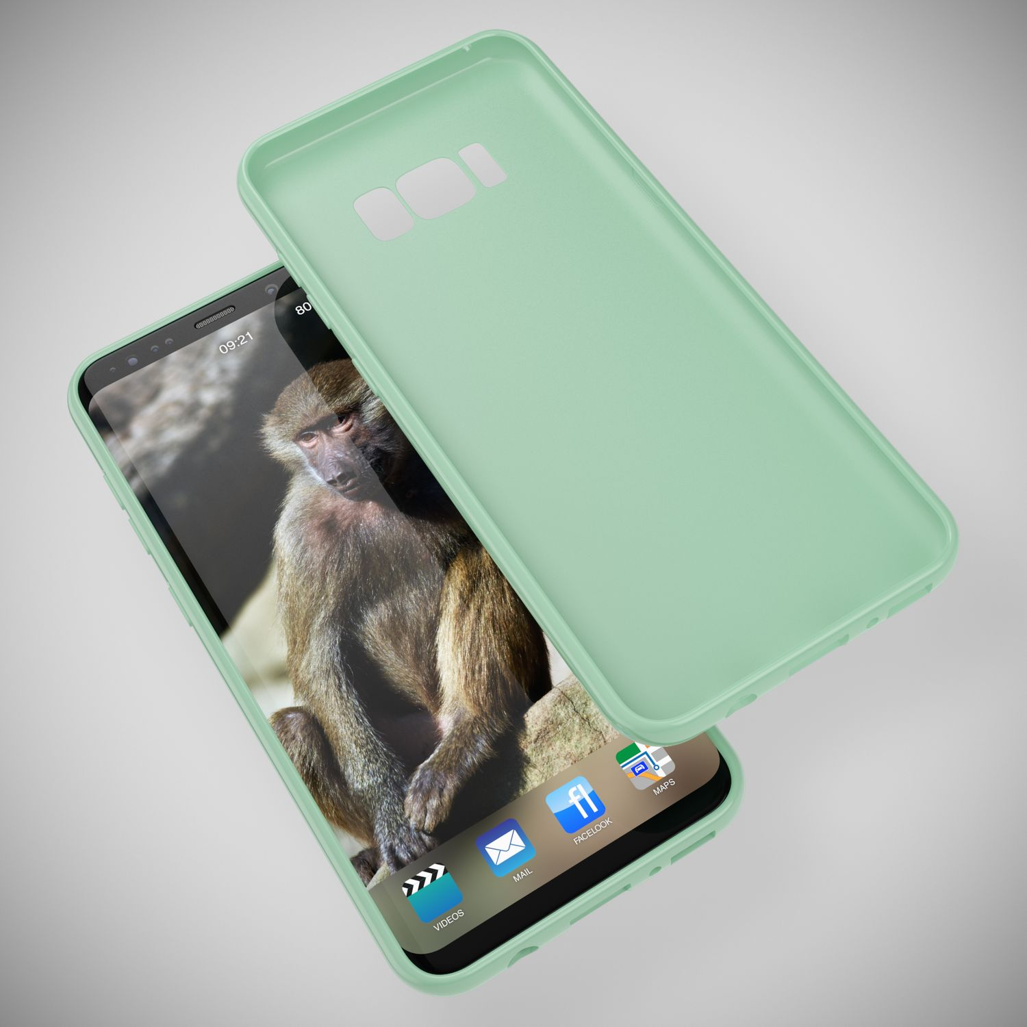 Ein Telefon mit mintgrüner Hülle, Bildschirm zeigt einen Affen. Die Hülle liegt daneben.