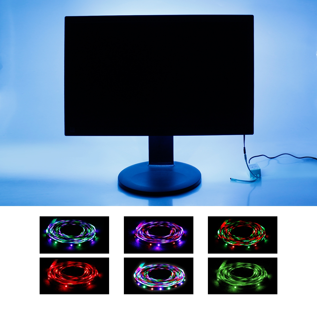 Ein Computermonitor mit blauem Hintergrundlicht. Darunter sind sechs LED-Lichtstreifen.