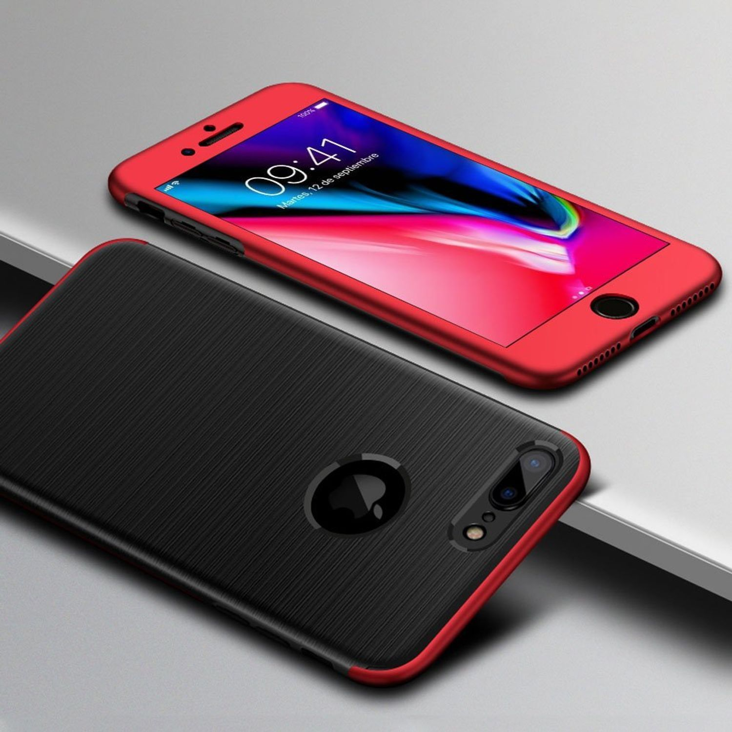 Rote und schwarze Handyhülle, geöffnet. Ein rotes Telefon ist drin. Uhr wird angezeigt.