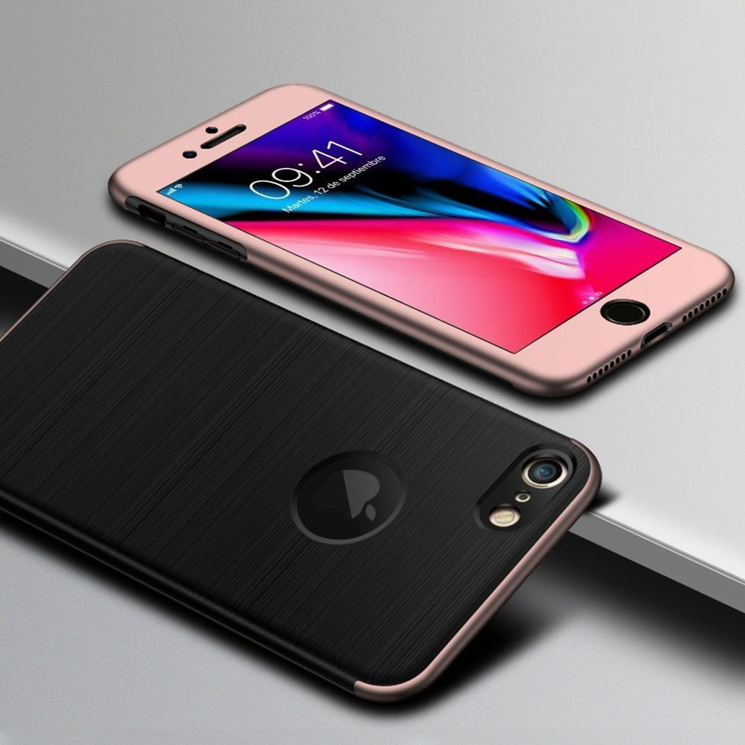 Ein Telefon mit schwarzer Hülle neben einem Telefon mit roségoldener Hülle.