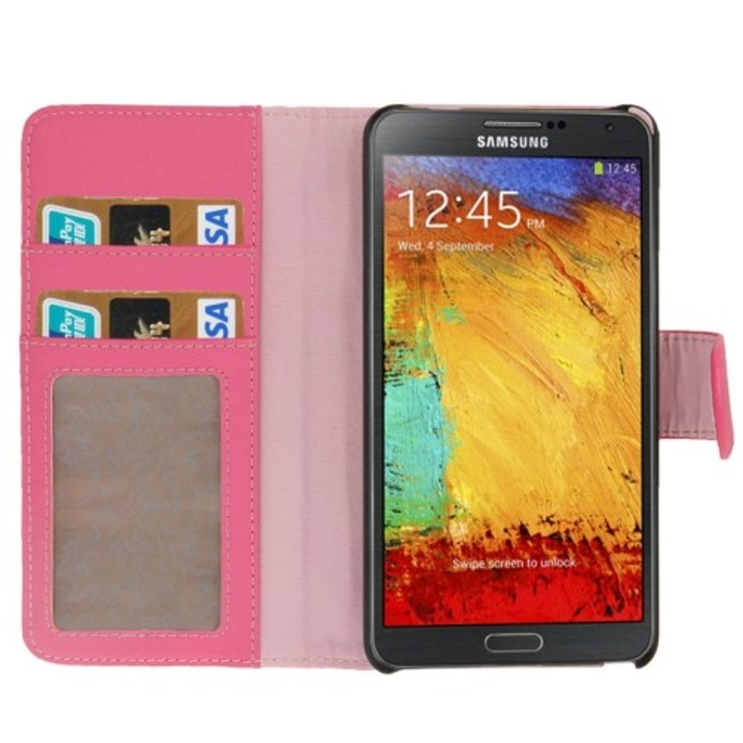 Offene rosa Handyhülle mit Telefon, das die Uhrzeit anzeigt, mit Karten, auf Weiß.
