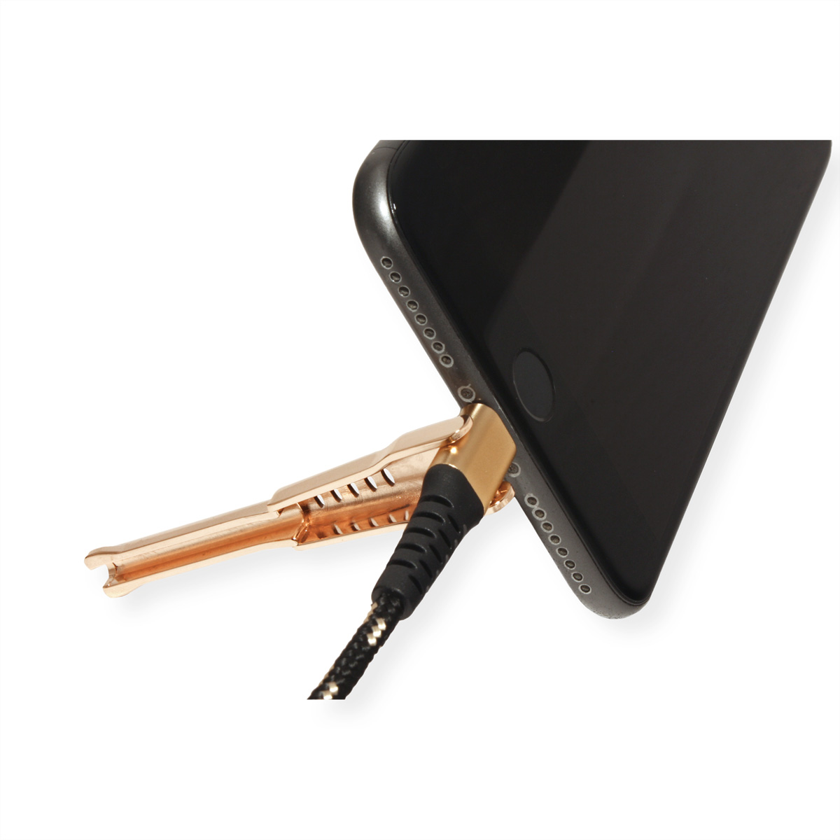 A gold-colored headphone jack is plugged into a black phone. White background.