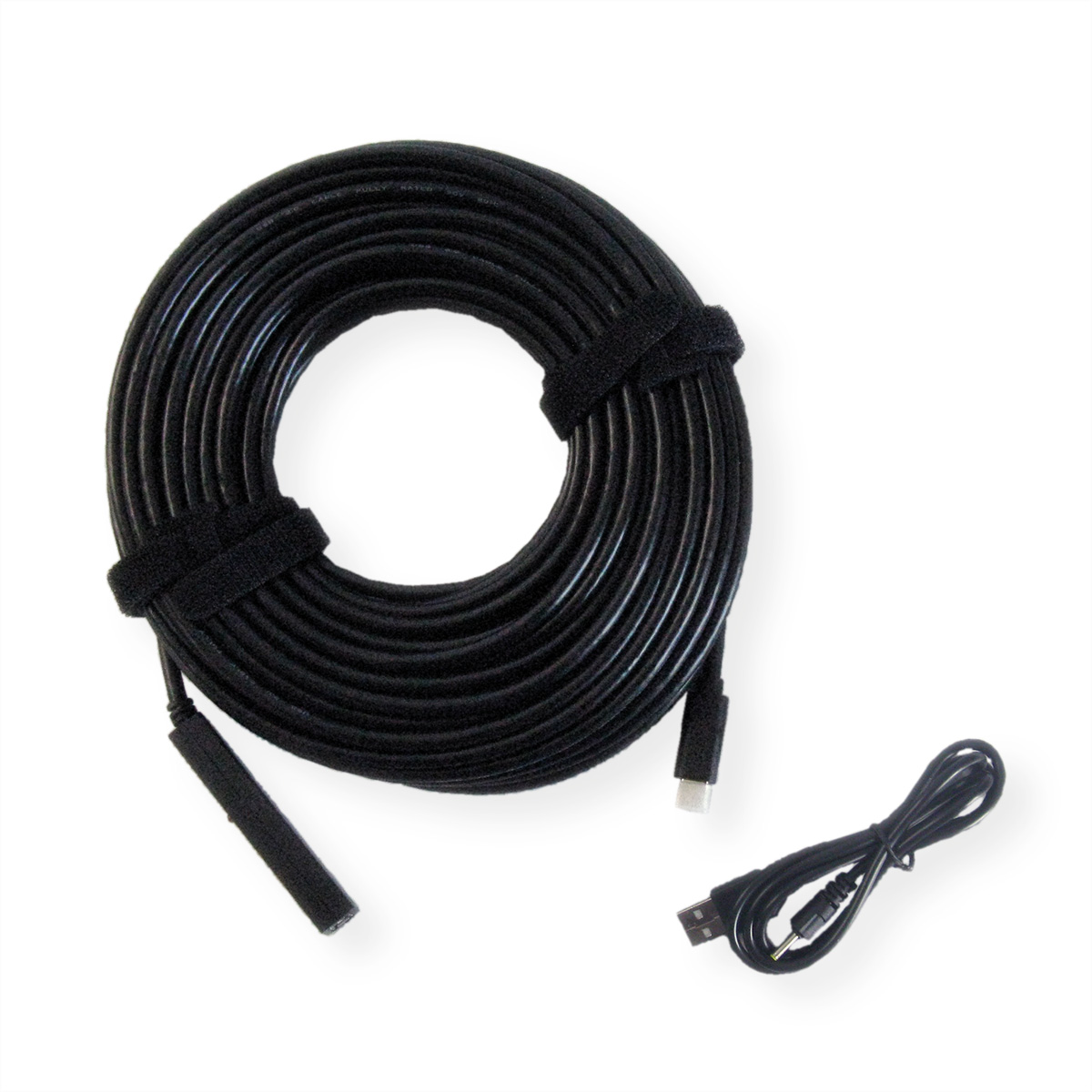 Câble noir enroulé avec deux sangles velcro et connecteurs, sur fond blanc.