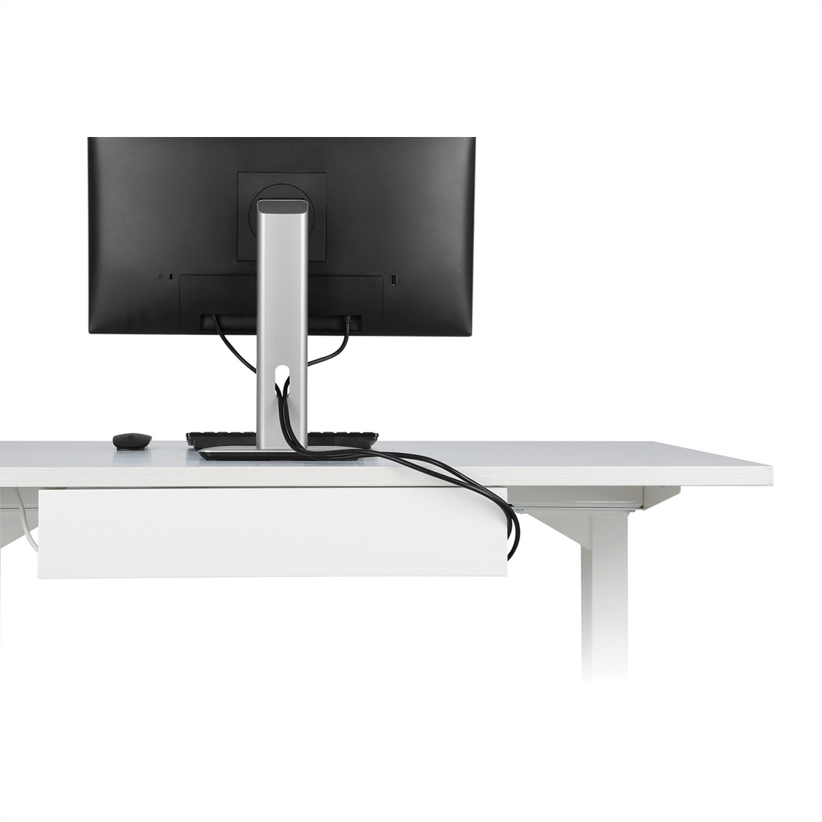 Un monitor, tastiera, mouse e un cassetto bianco sotto una scrivania bianca.