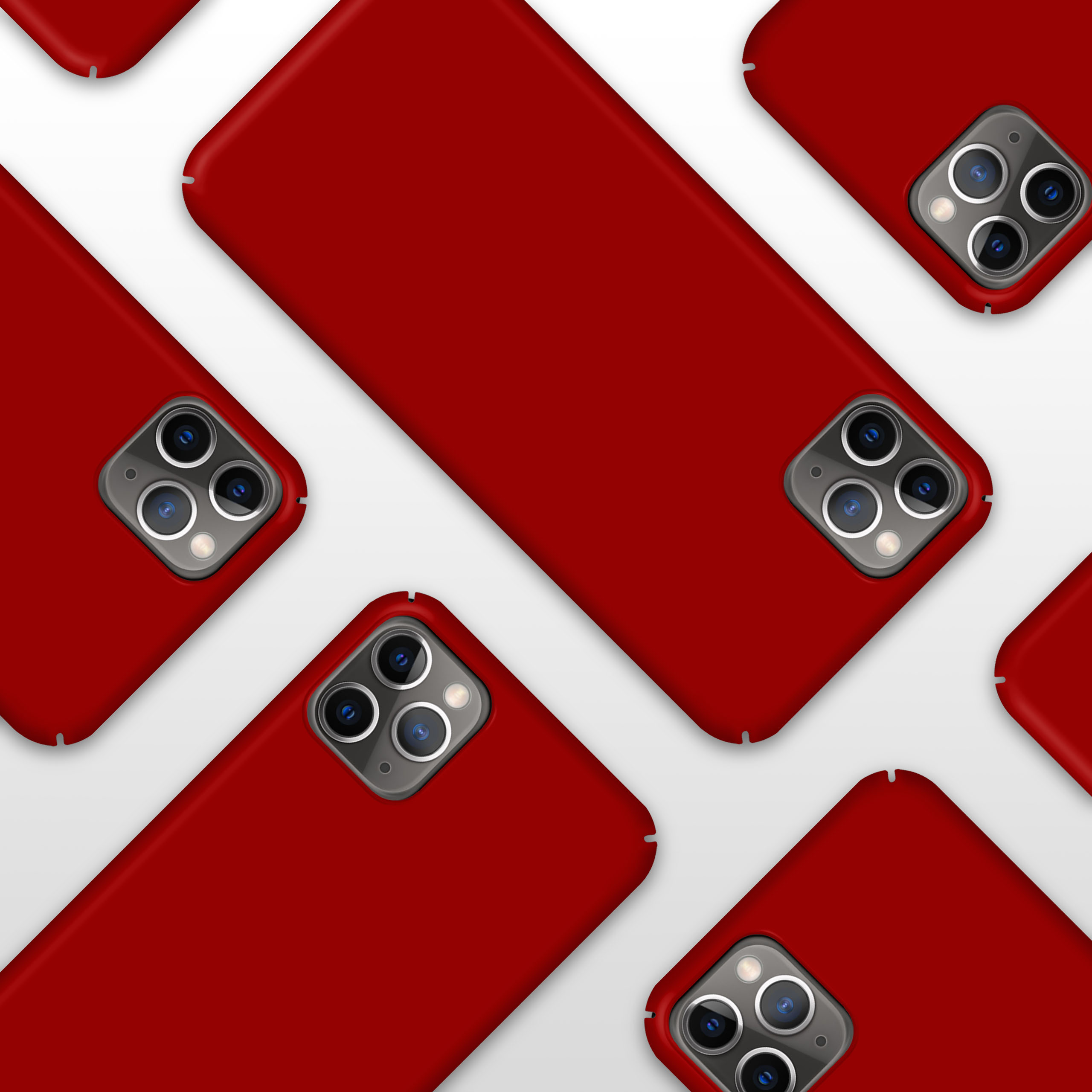 Rote Telefonhüllen mit Kameras sind auf einer weißen Oberfläche verstreut.