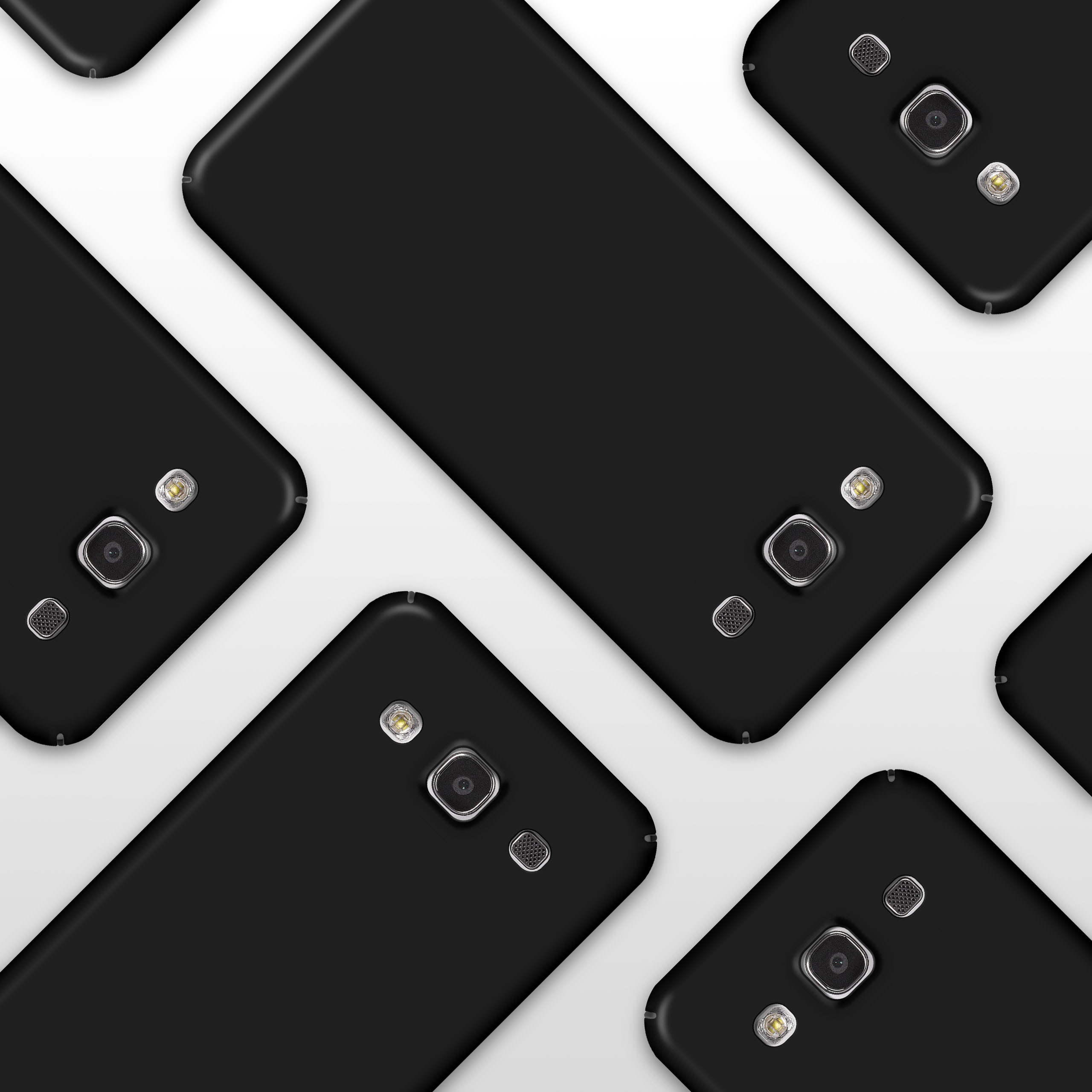 Mehrere schwarze Telefone mit Kameras auf weißem Hintergrund, in einem Muster angeordnet.