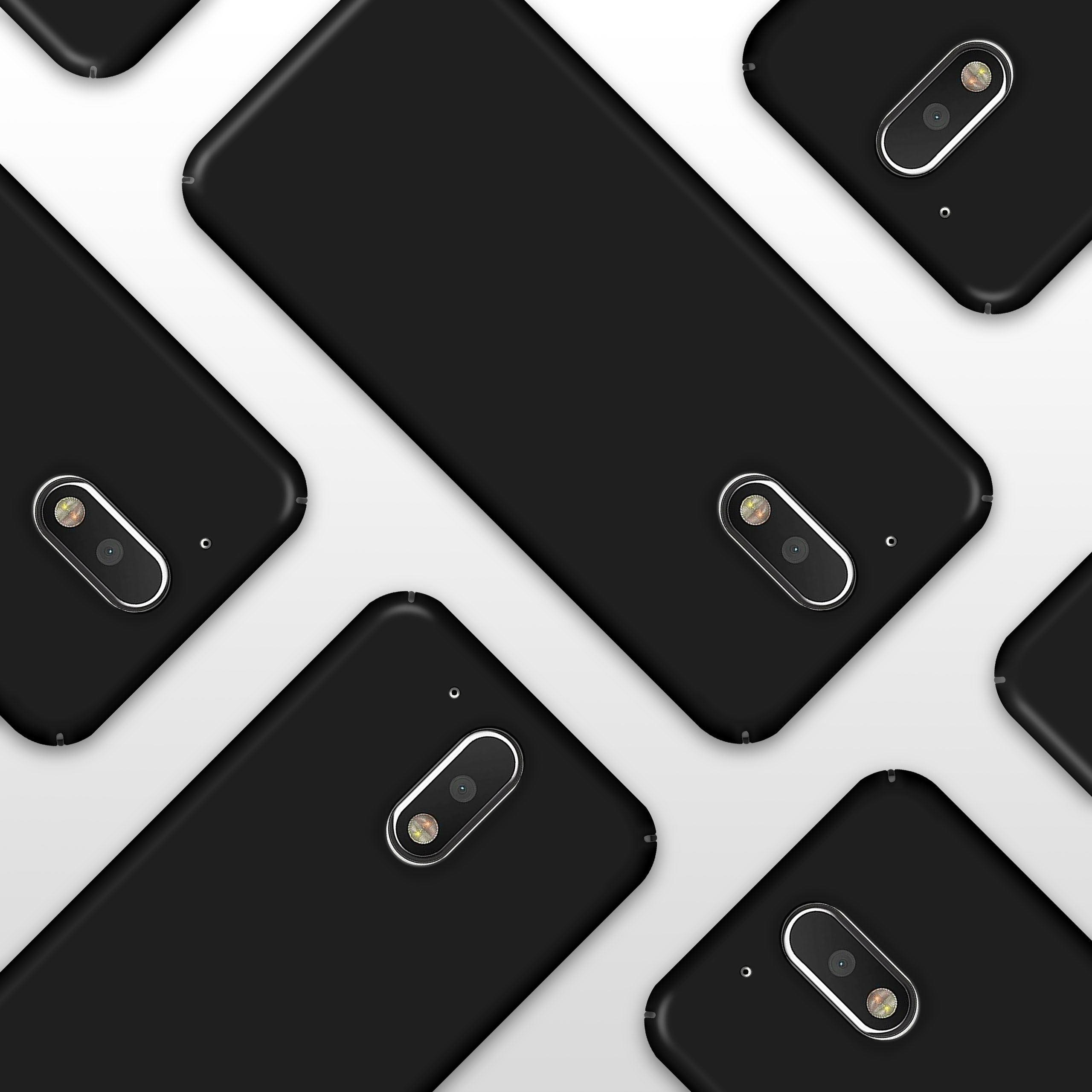 Mehrere schwarze Telefone sind angeordnet. Jedes hat eine Kameralinse, auf weißem Grund.